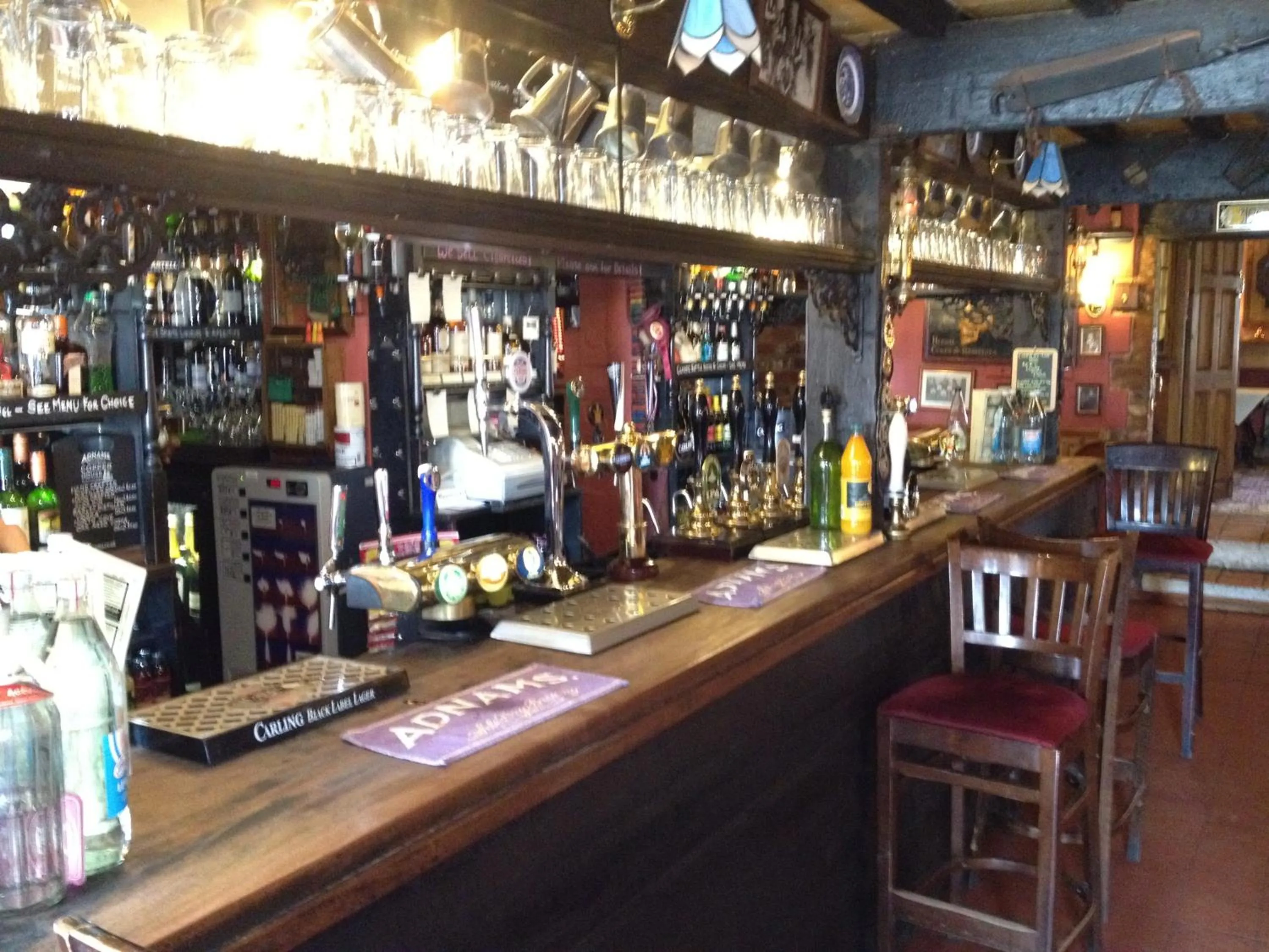 Lounge or bar in The Olde Windmill Inn