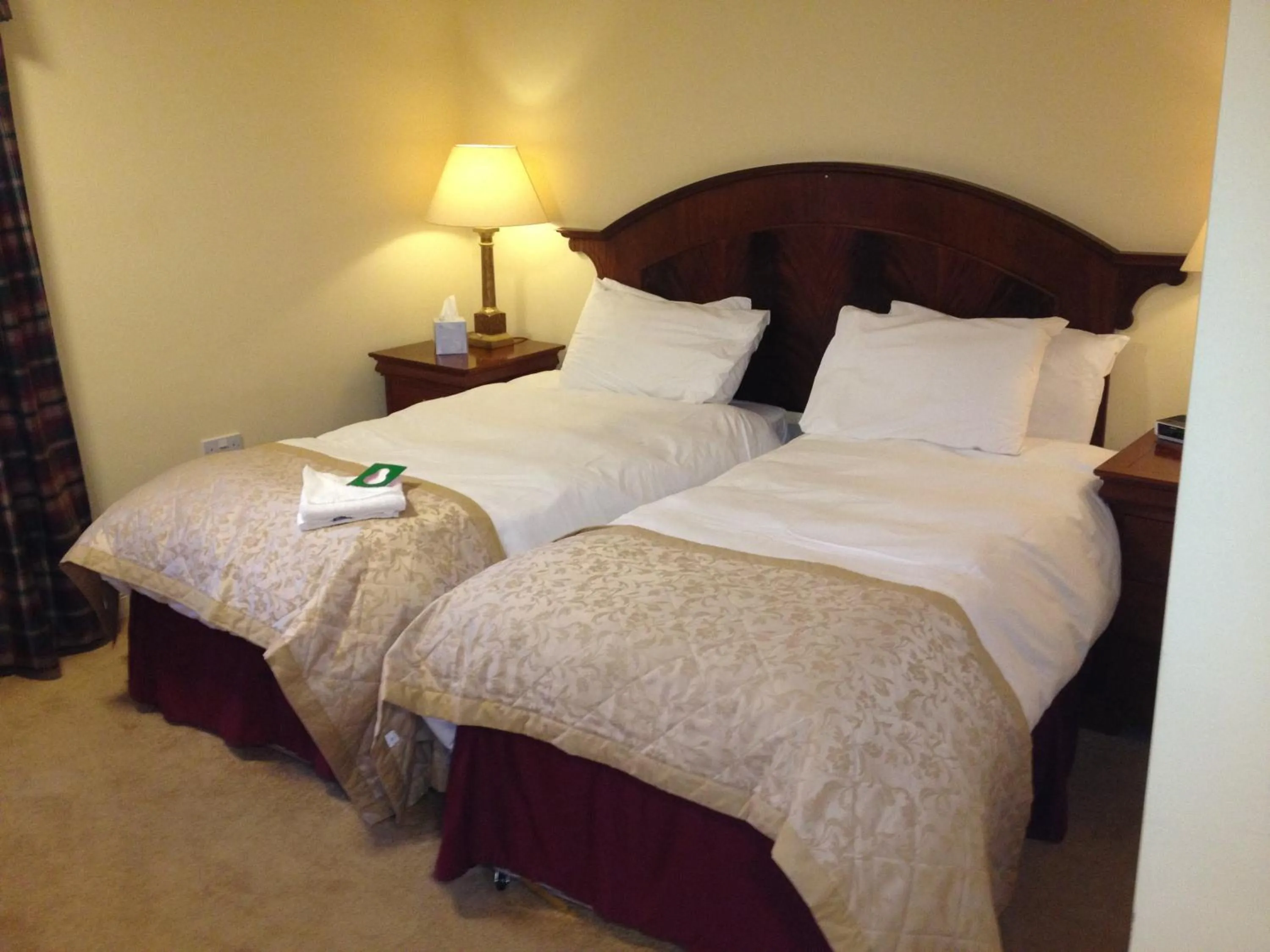 Bed in The Olde Windmill Inn