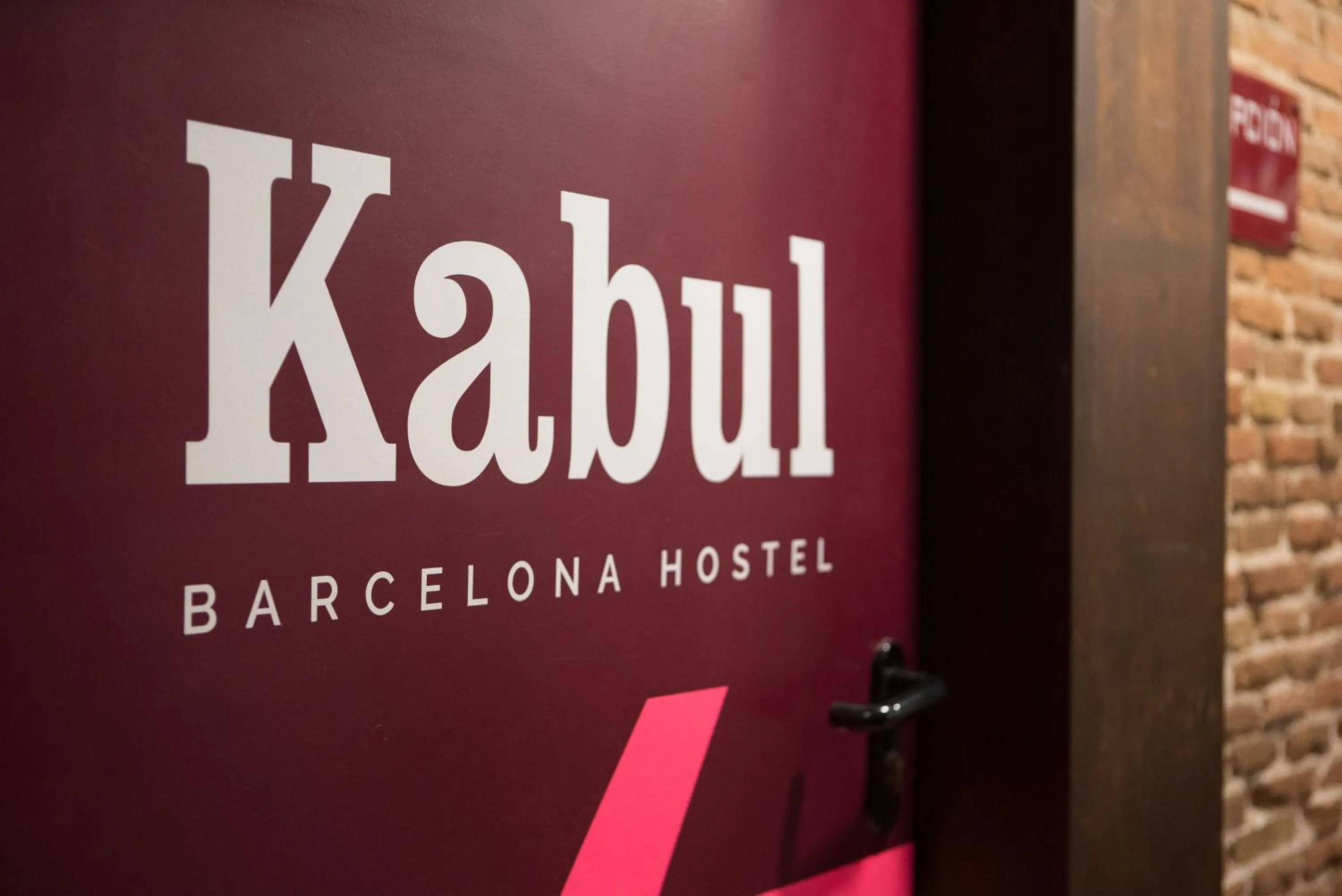 Property logo or sign in Kabul Party Hostel Barcelona