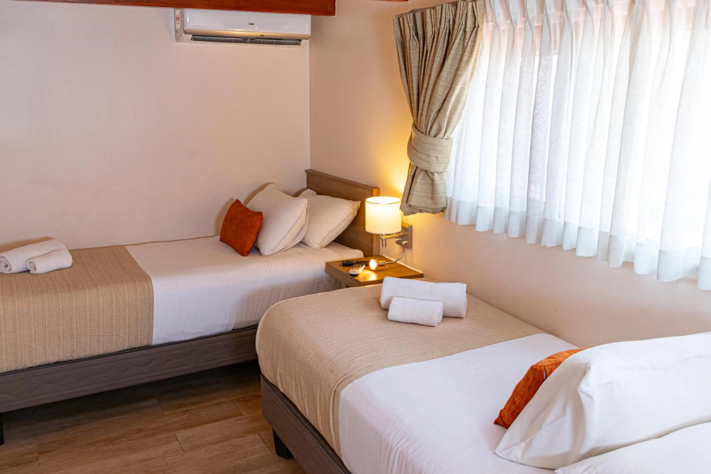 Bed in Tagle Hotel Boutique