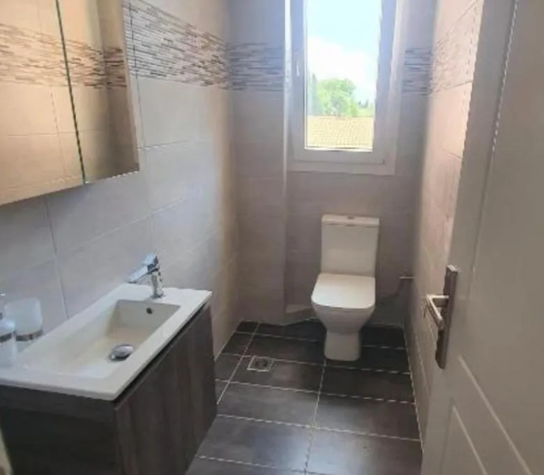 Toilet in BELLA De LUX APTS