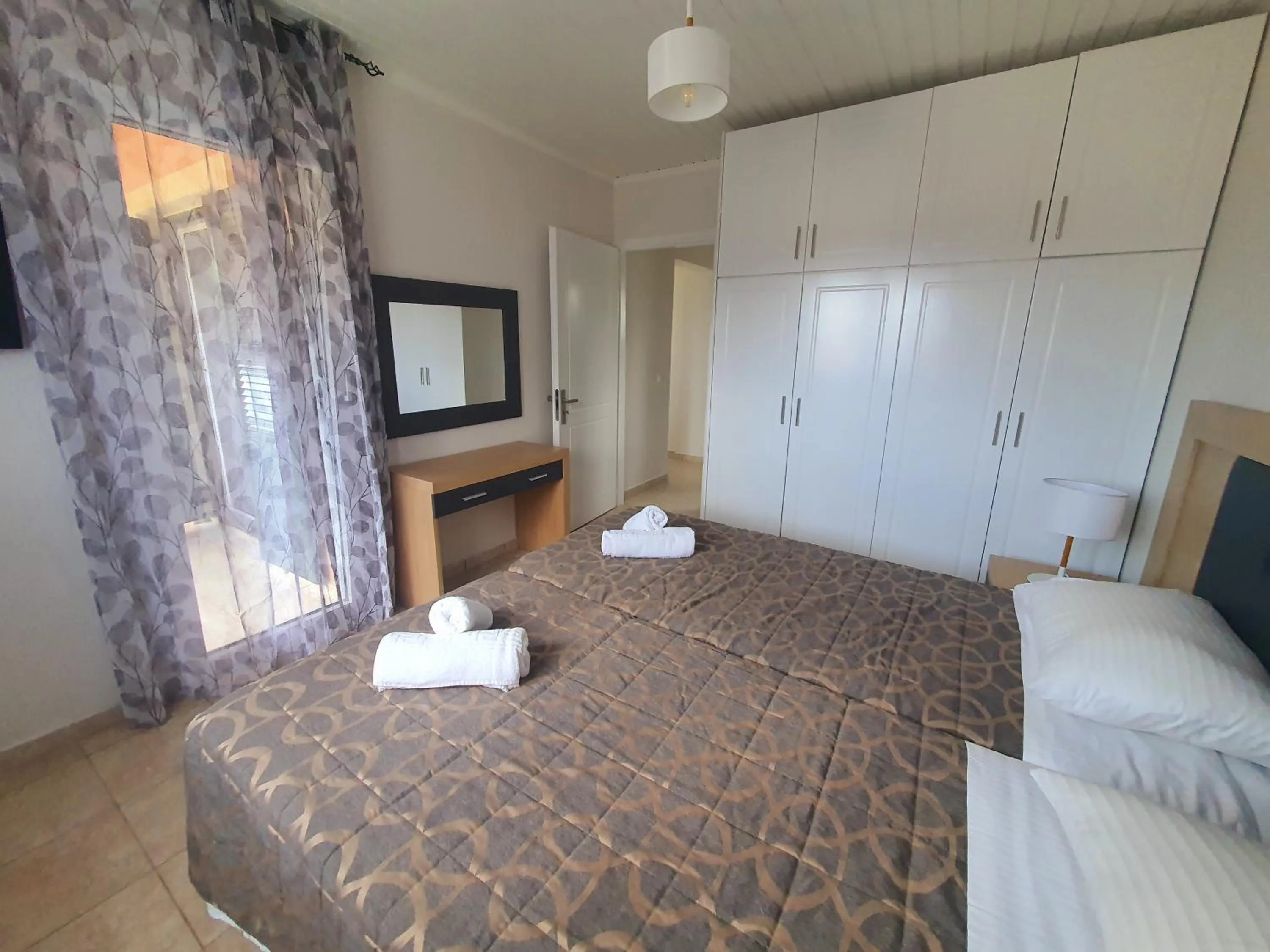 Bed in BELLA De LUX APTS