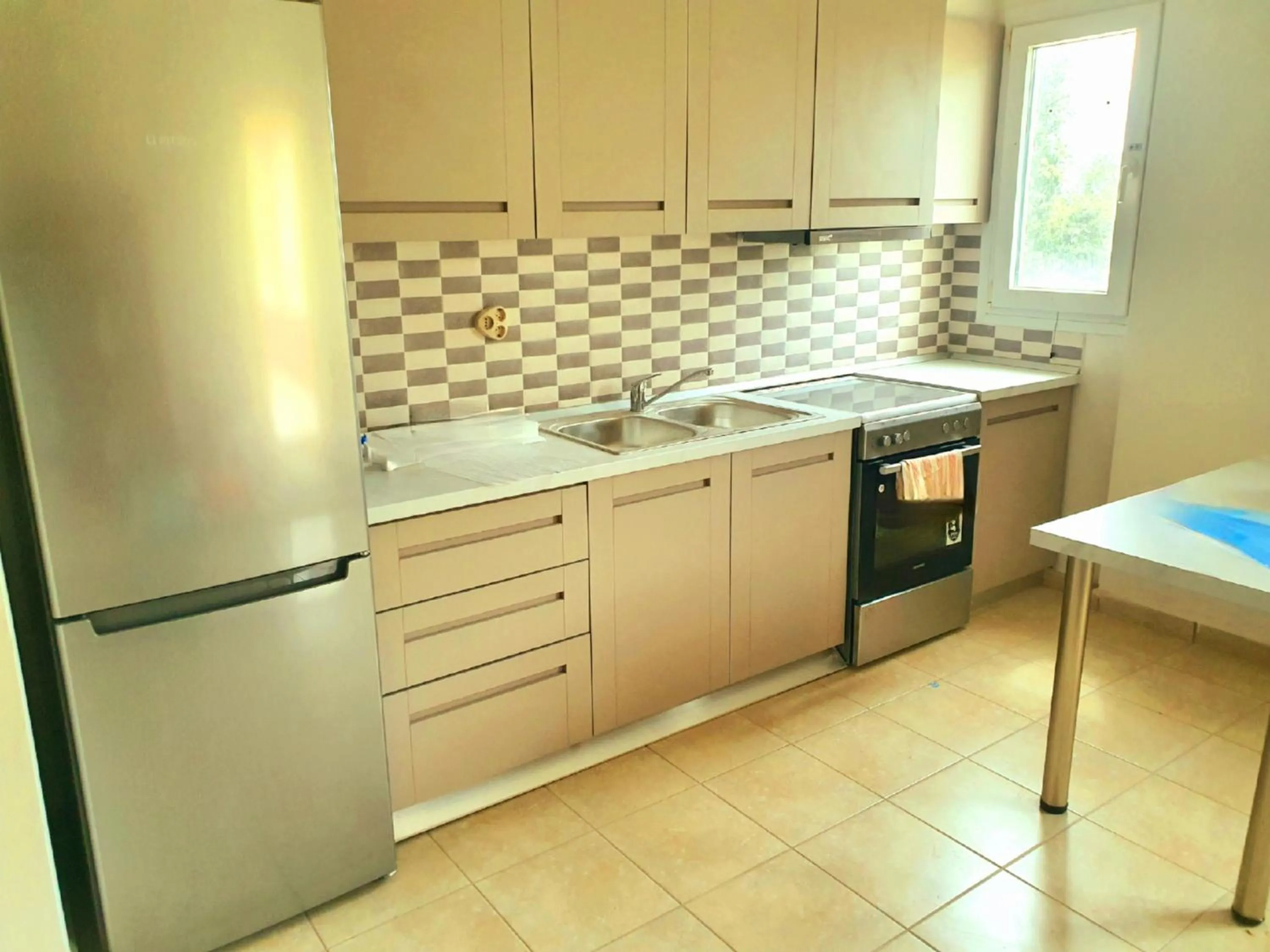 Dining area in BELLA De LUX APTS