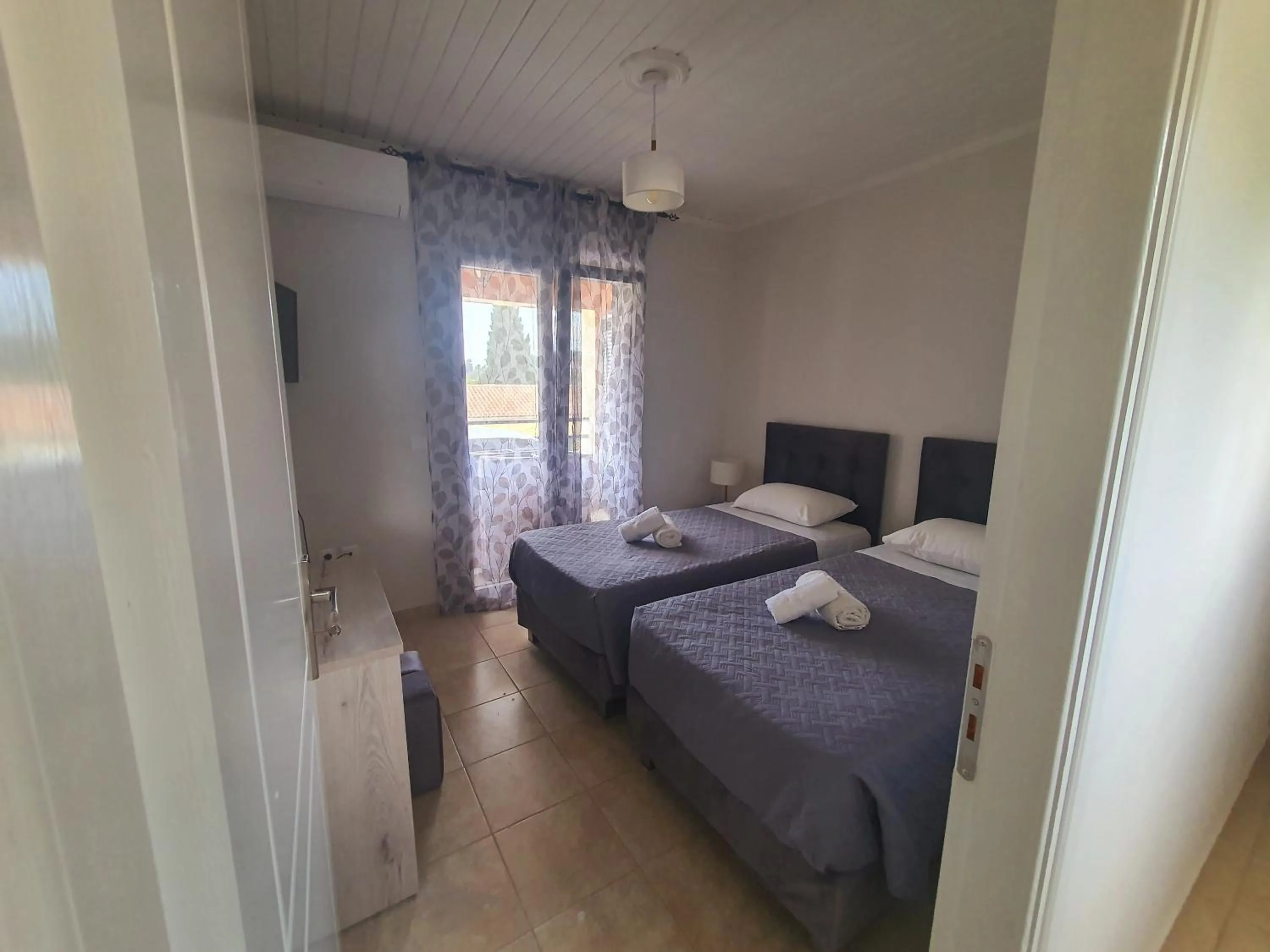 Bed in BELLA De LUX APTS