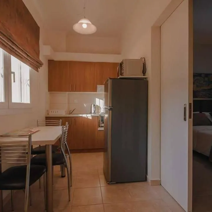 Kitchen or kitchenette in BELLA De LUX APTS
