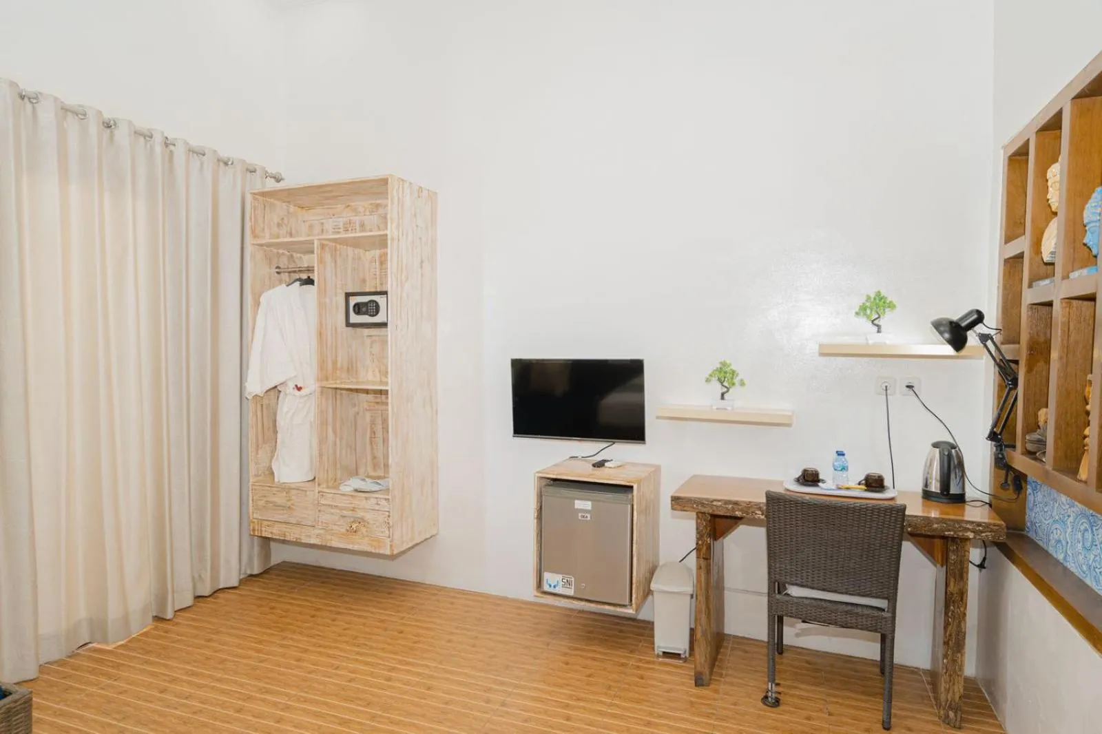 TV and multimedia in Pandawa Resort & Spa Seaview