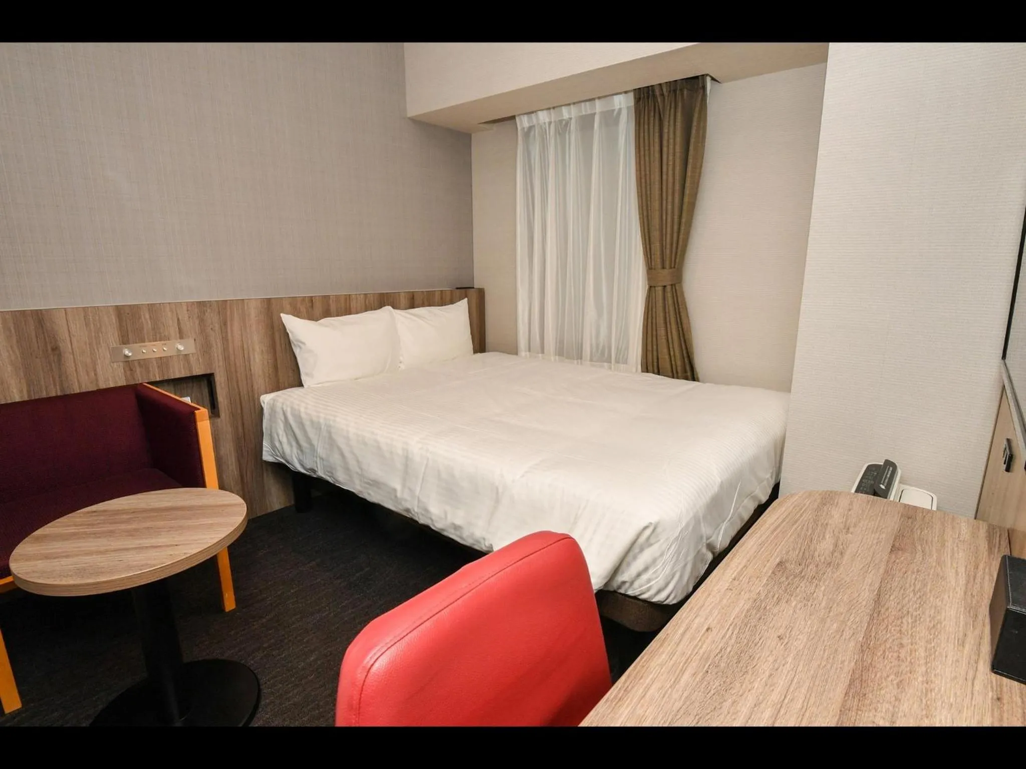 Bed in Sanco Inn Osaka Yodoyabashi