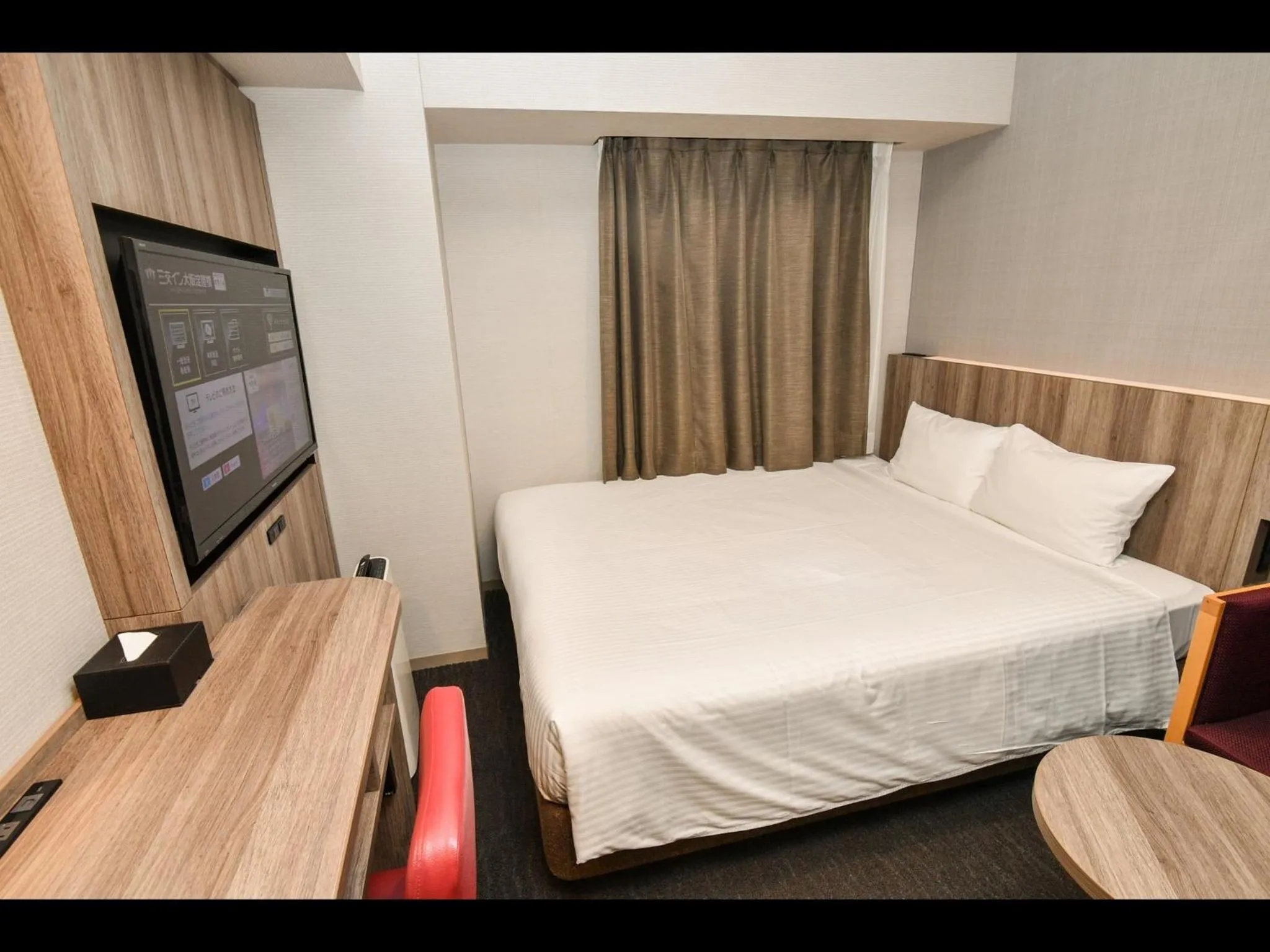 Bed in Sanco Inn Osaka Yodoyabashi