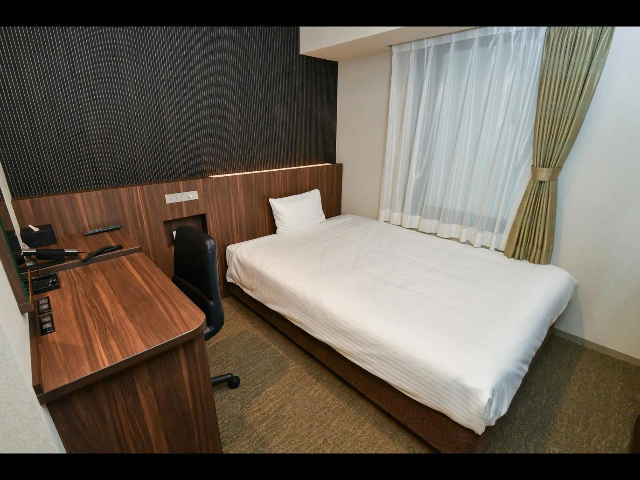 Bed in Sanco Inn Osaka Yodoyabashi