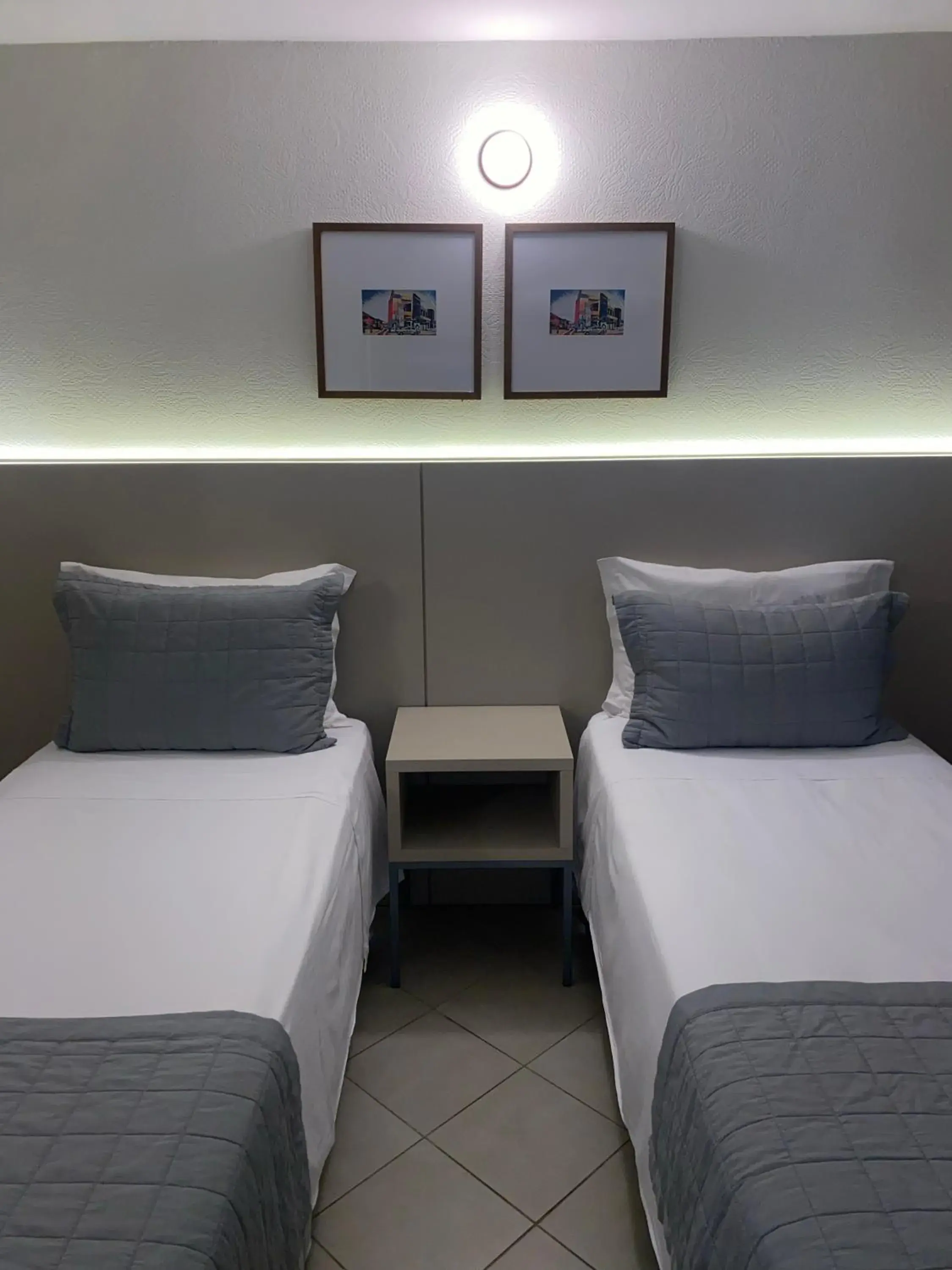 Standard Twin Room without Window - single occupancy in Malibu Plaza Hotel Standard Twin Room without Window - single occupancy in Malibu Plaza Hotel