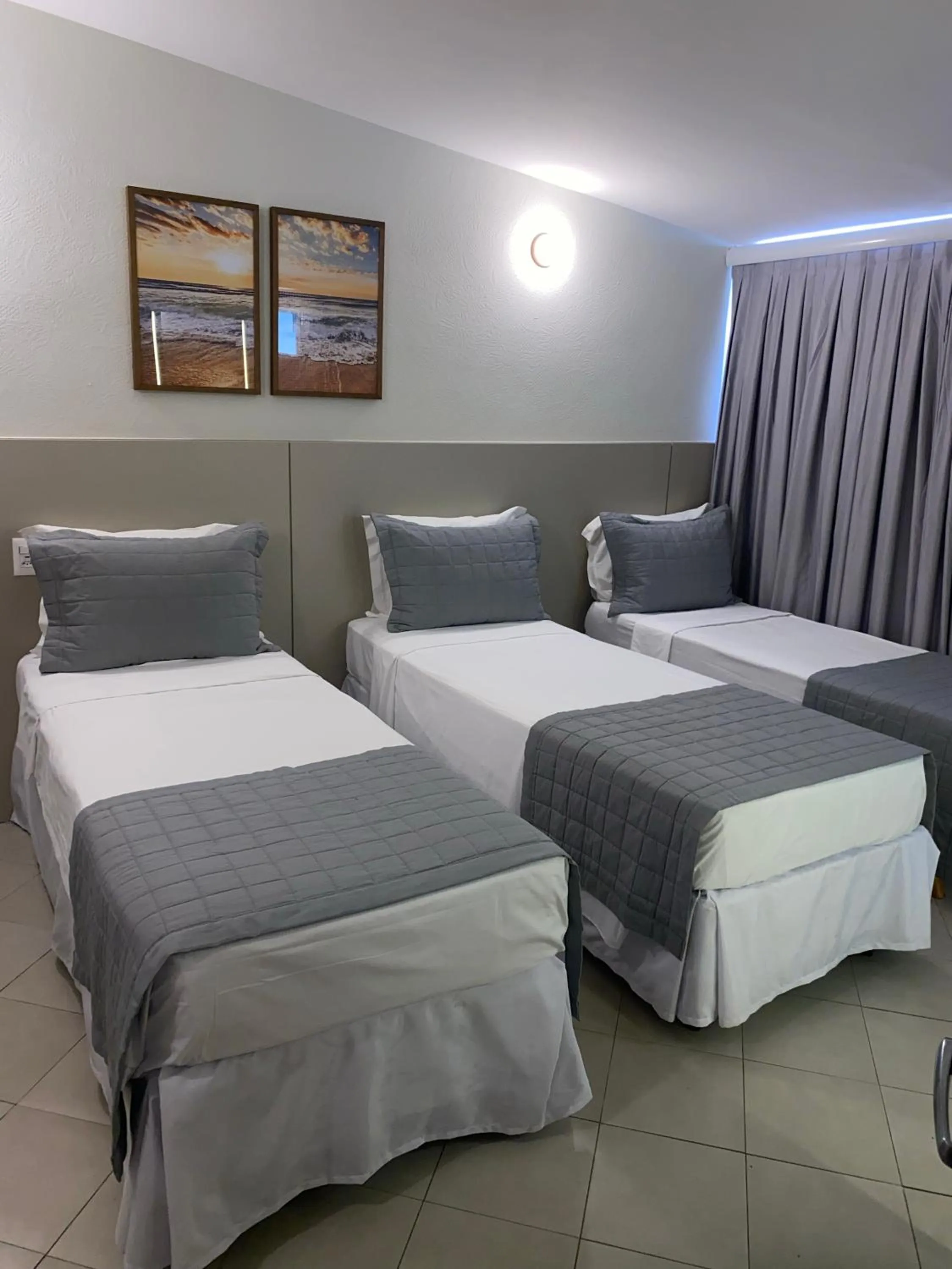 Bed in Malibu Plaza Hotel