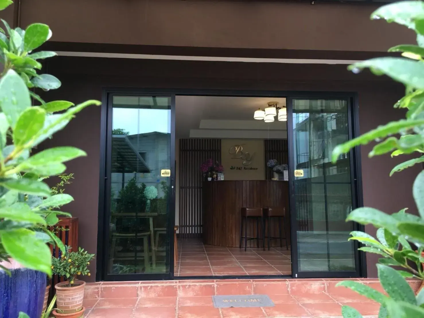 Facade/entrance in B and Y Residence Facade/entrance in B and Y Residence