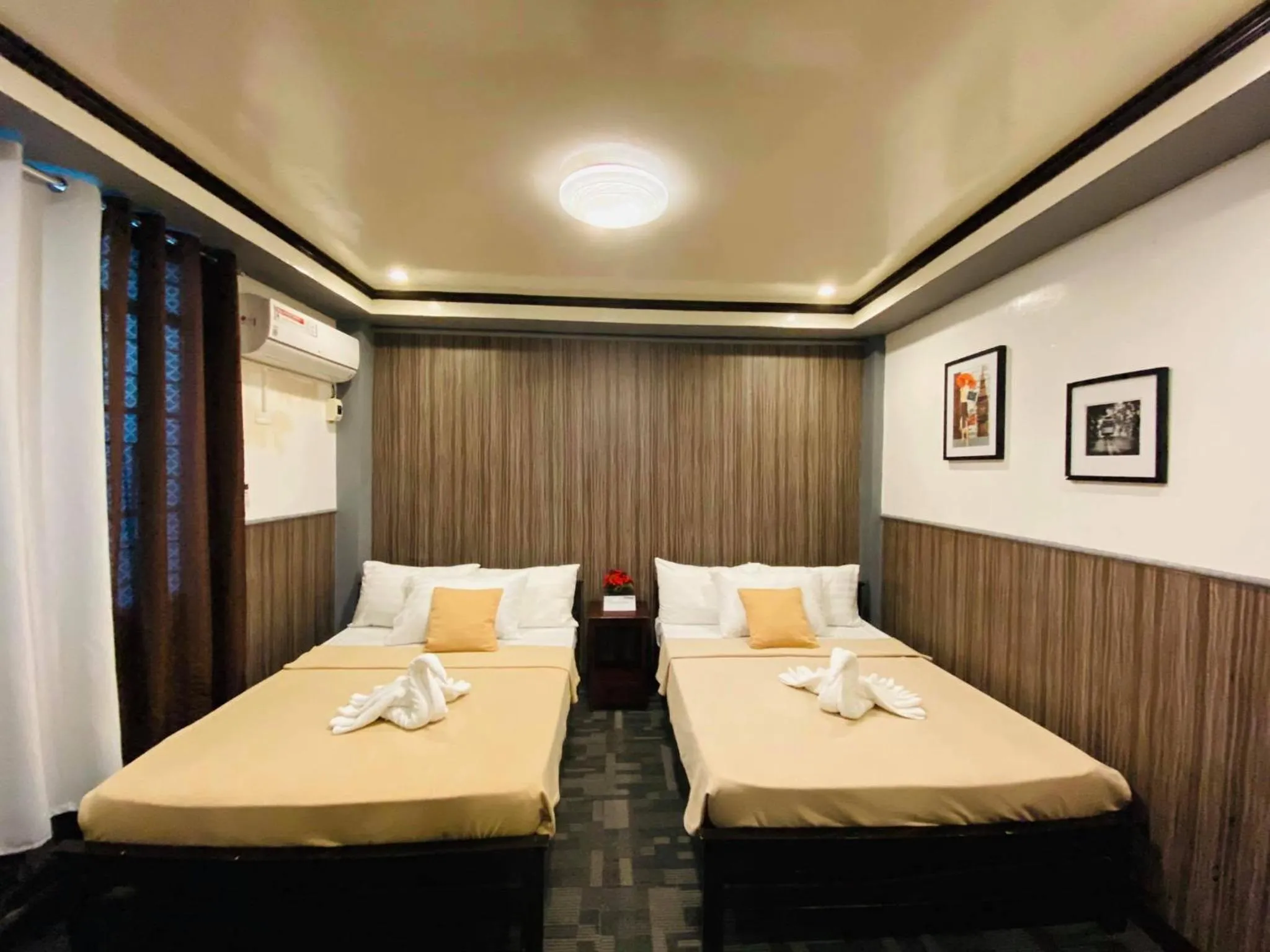 Bed in Amax Inn Makati