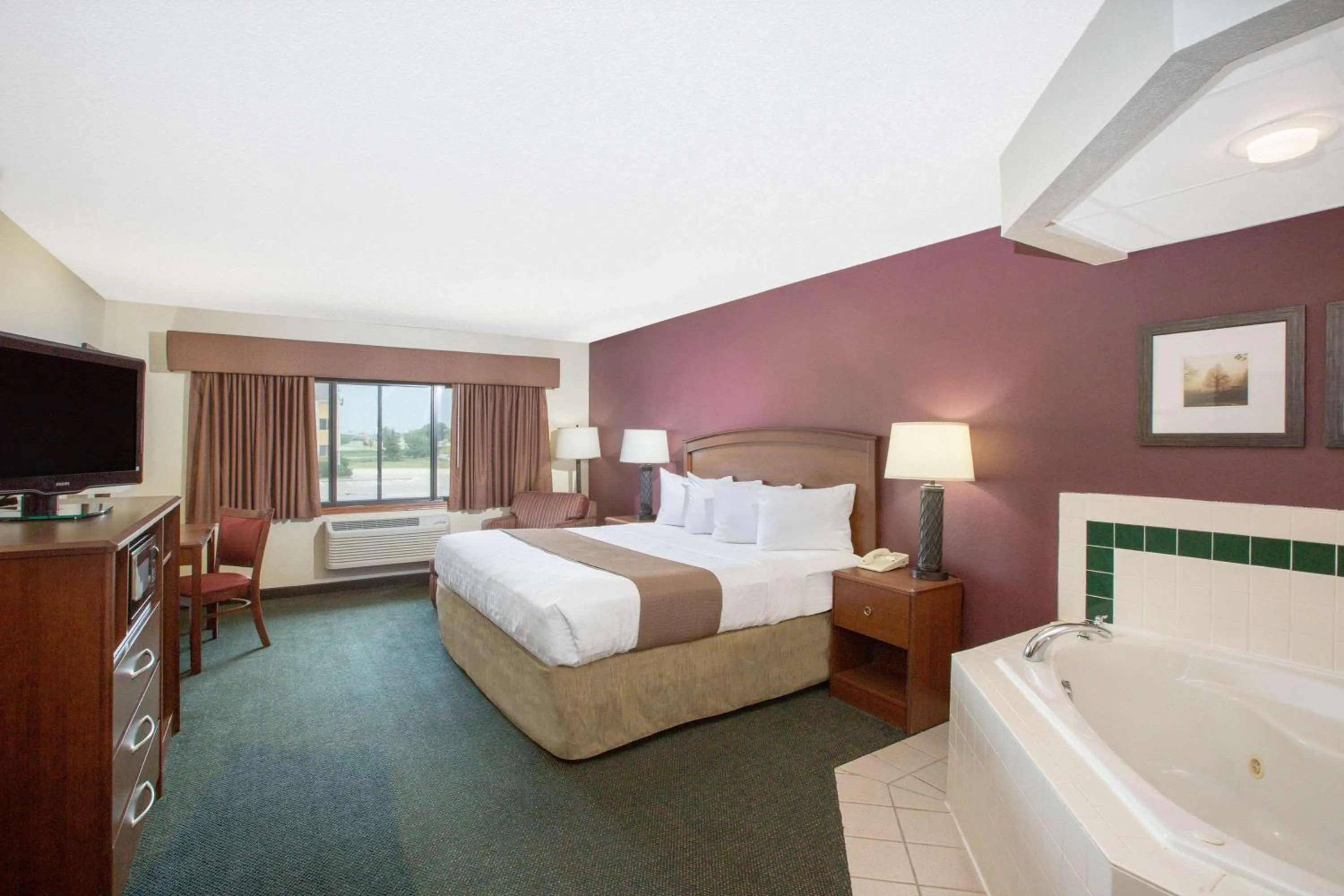 Photo of the whole room, Bed in AmericInn by Wyndham Kearney