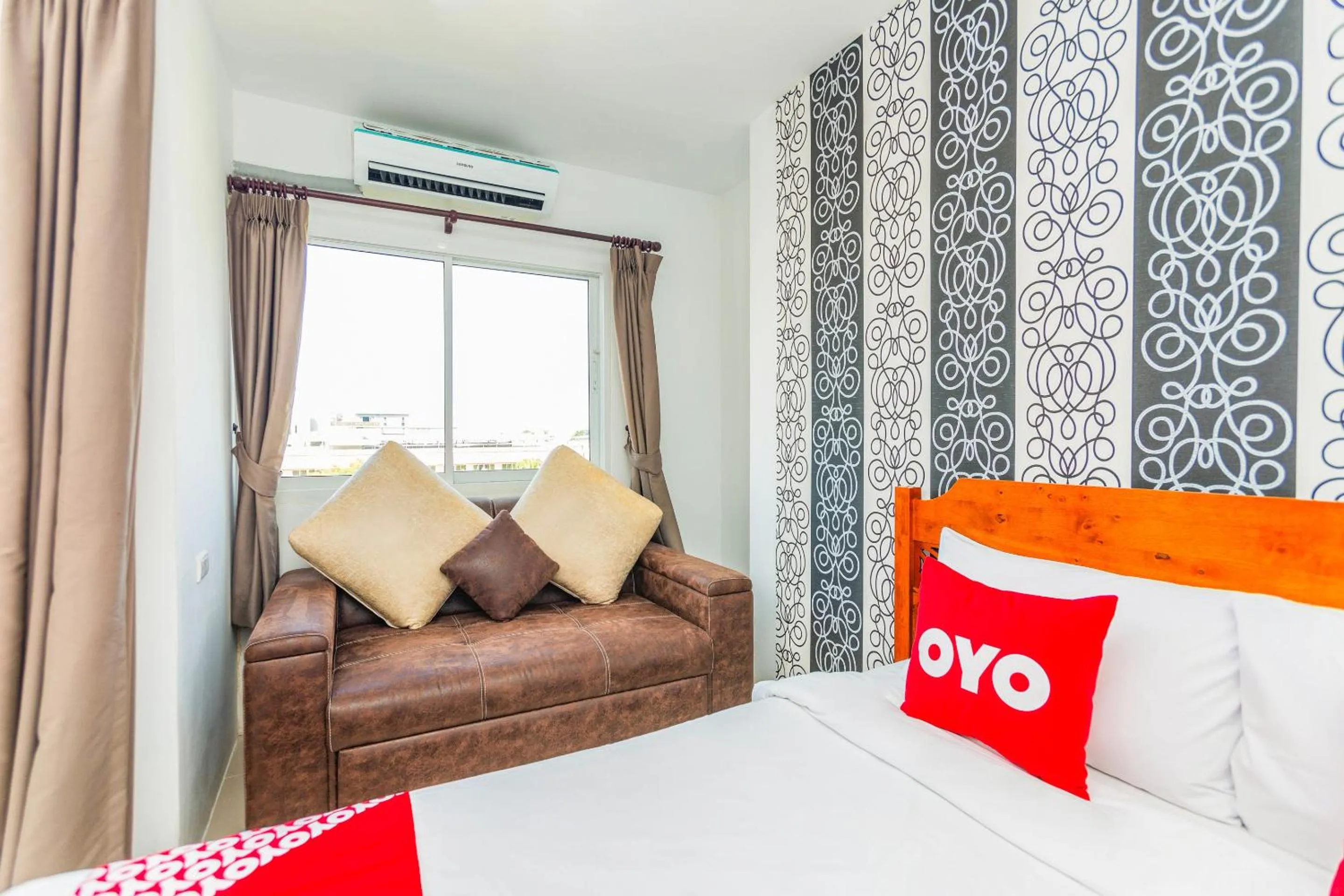 Bedroom in OYO 472 Tang Cheng Holiday Hotel