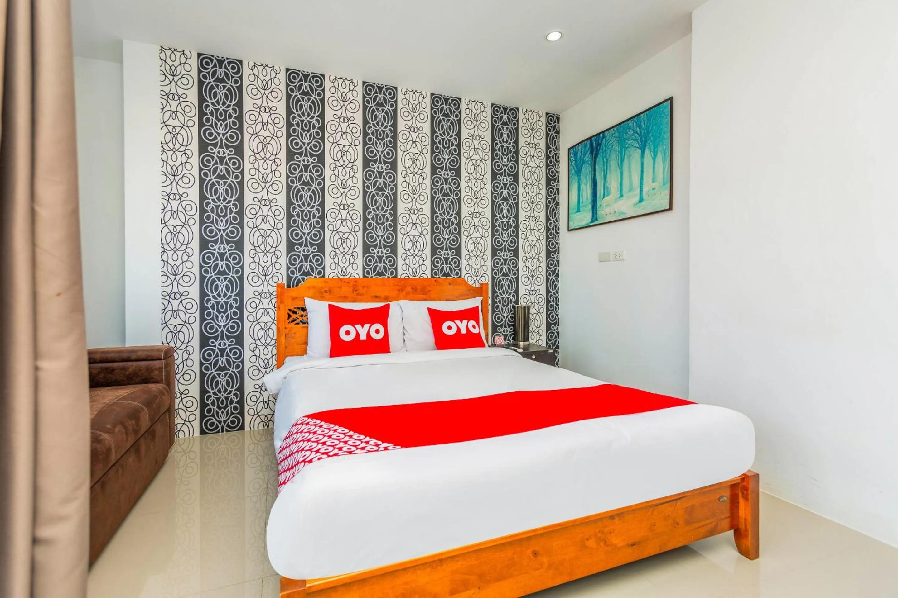 Bedroom in OYO 472 Tang Cheng Holiday Hotel