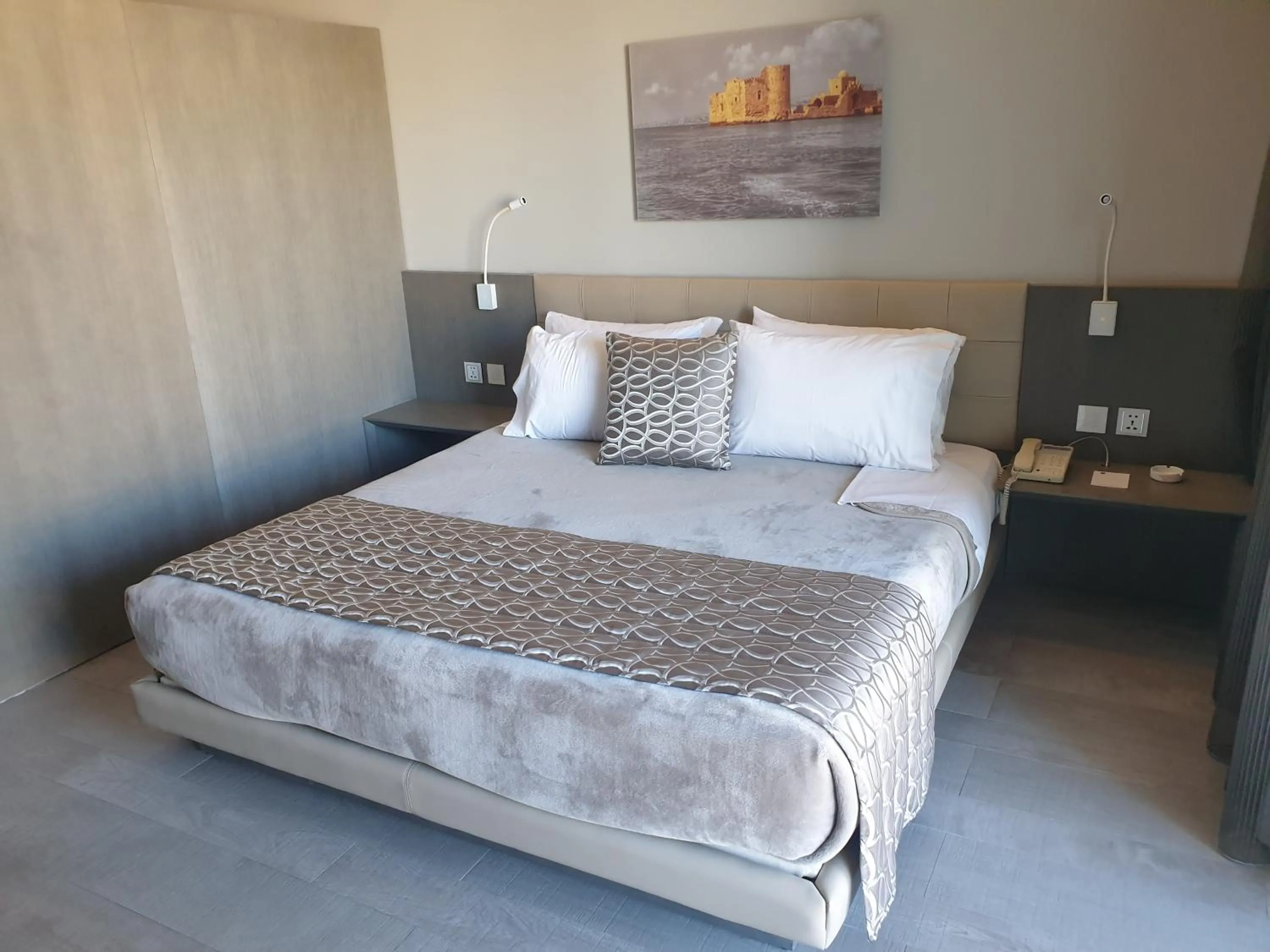 Bed in Promenade Hotel