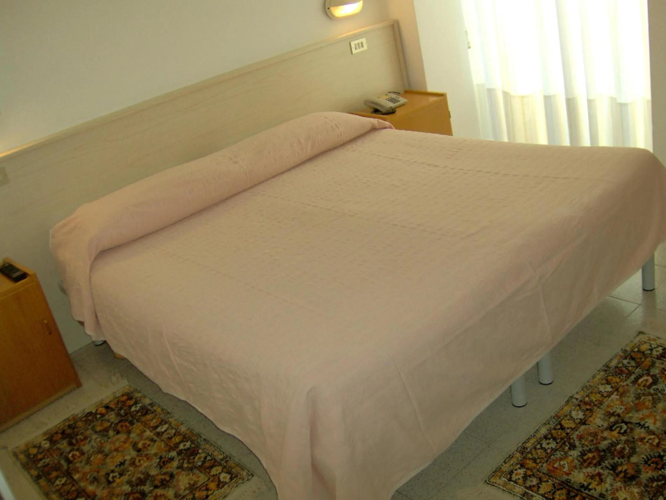 Bedroom in Hotel Cavalluccio Marino