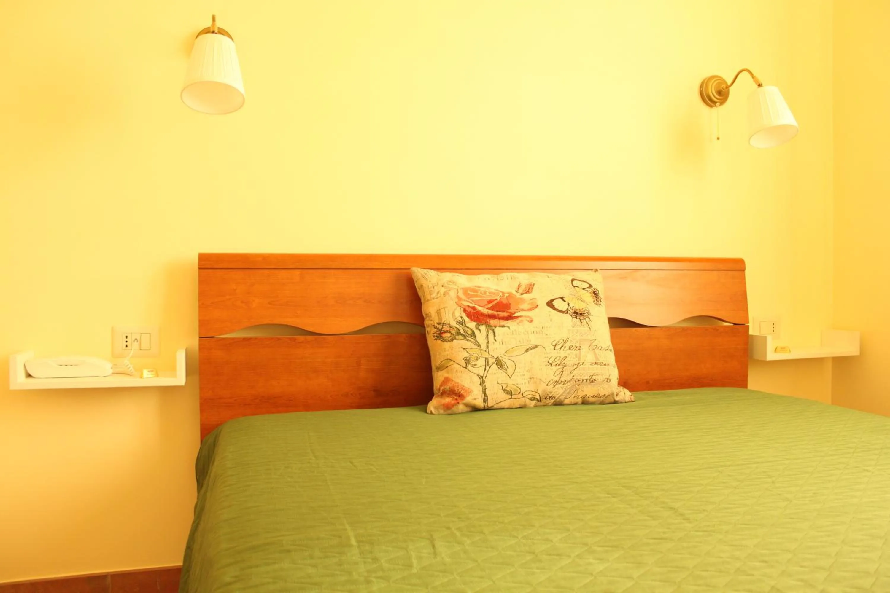 Bed in B&B Il Falco e l'Ulivo