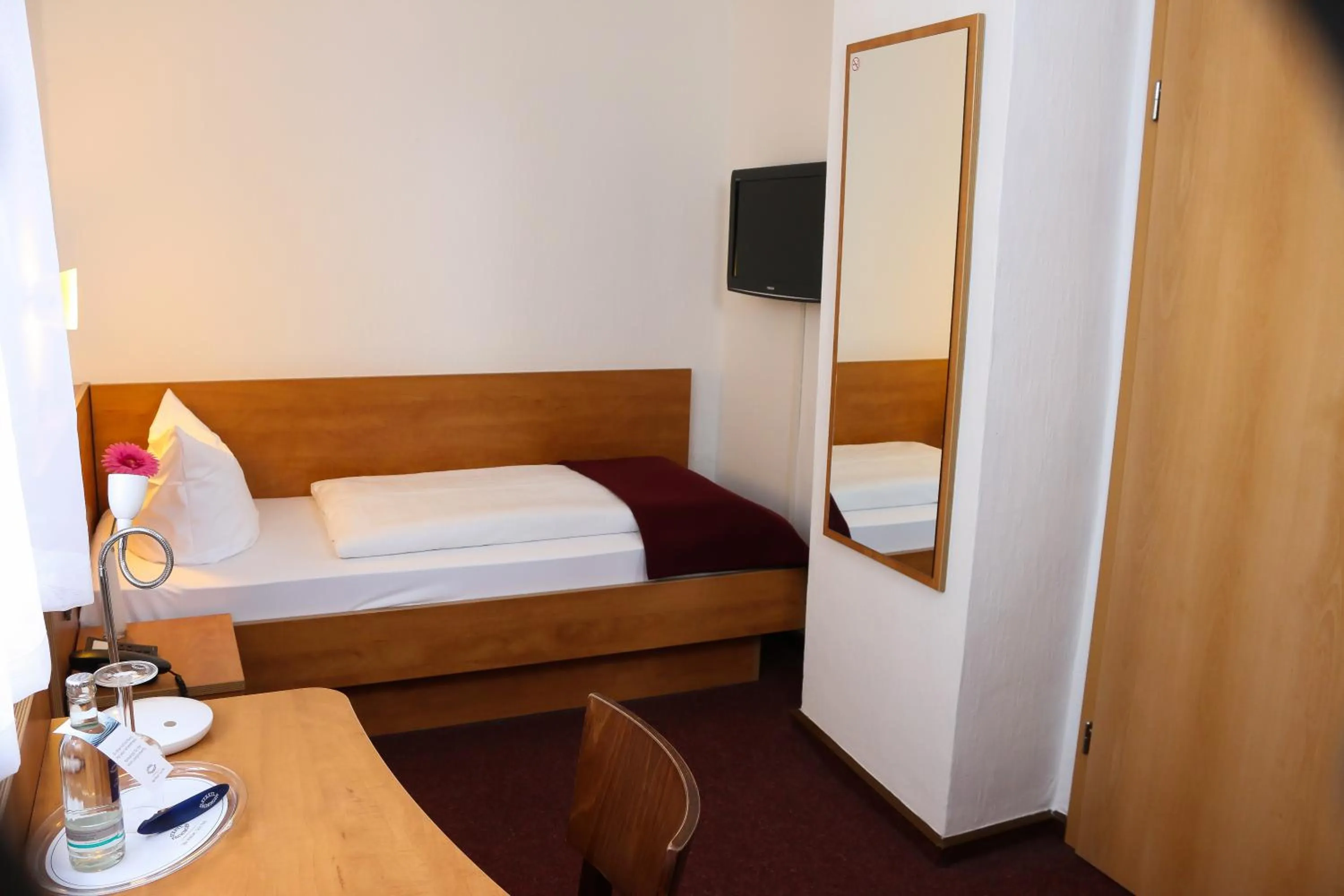 Bed in City Hotel Journal