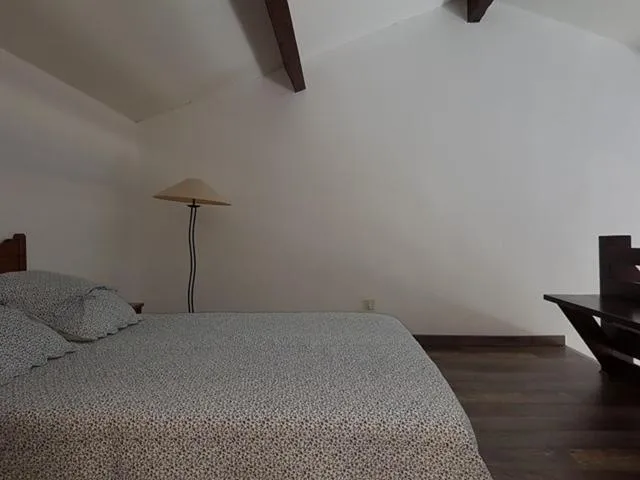 Bed in Résidence Costa d'Oru