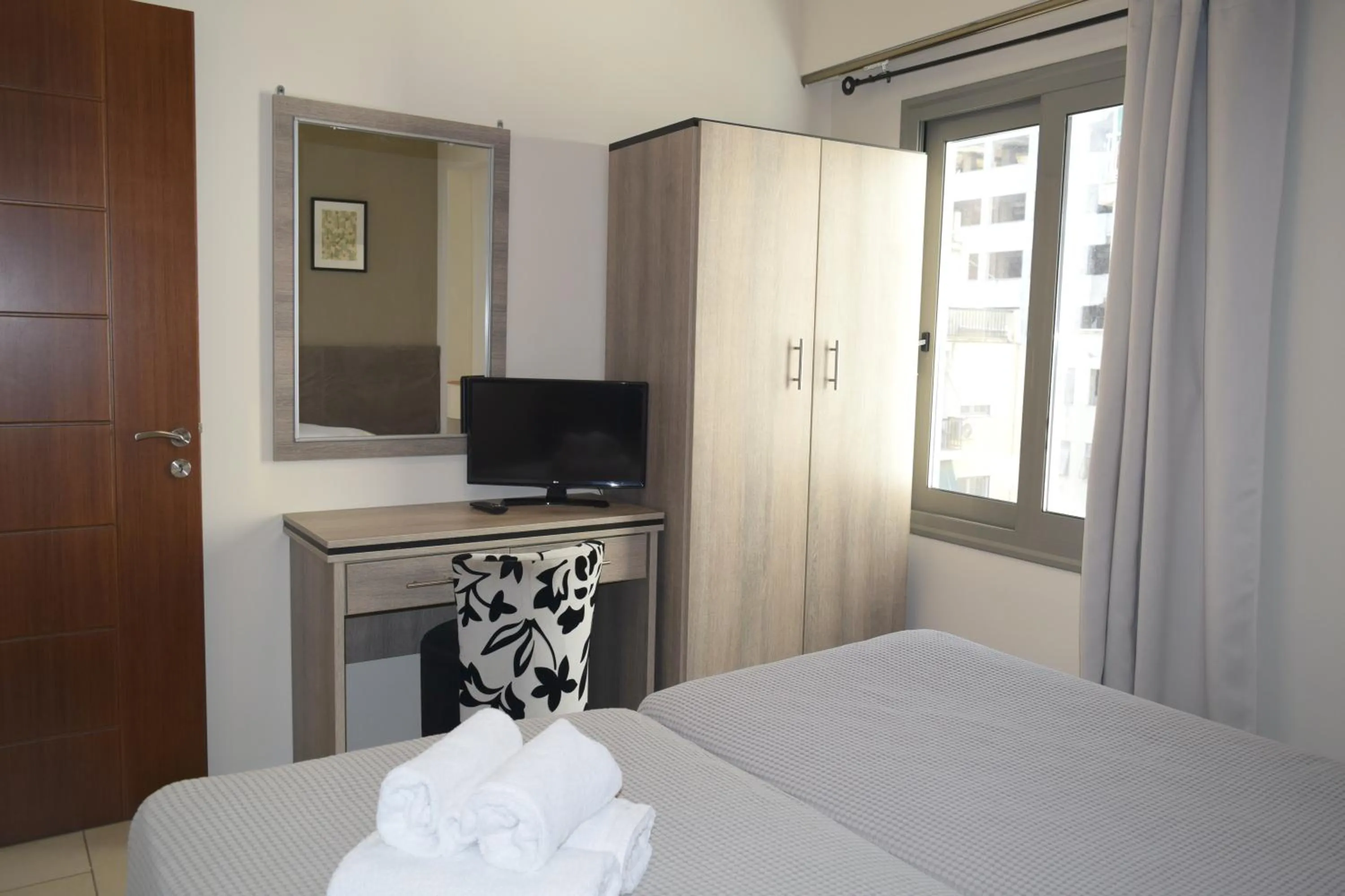 Bedroom in Athenian Central Apartments