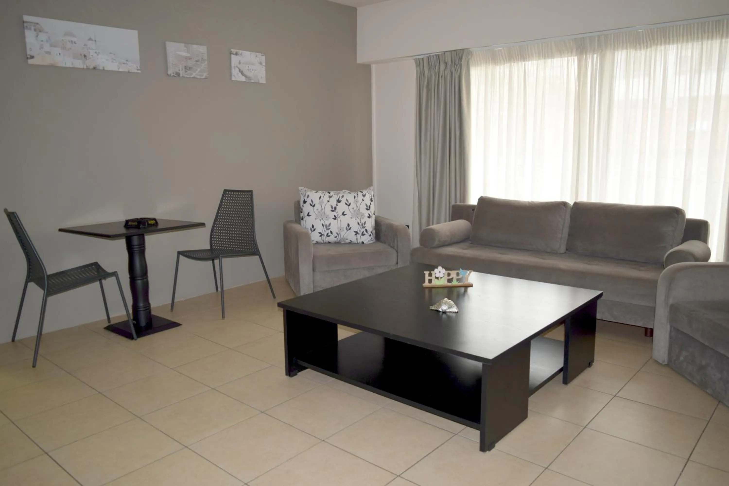 Seating area in Athenian Central Apartments