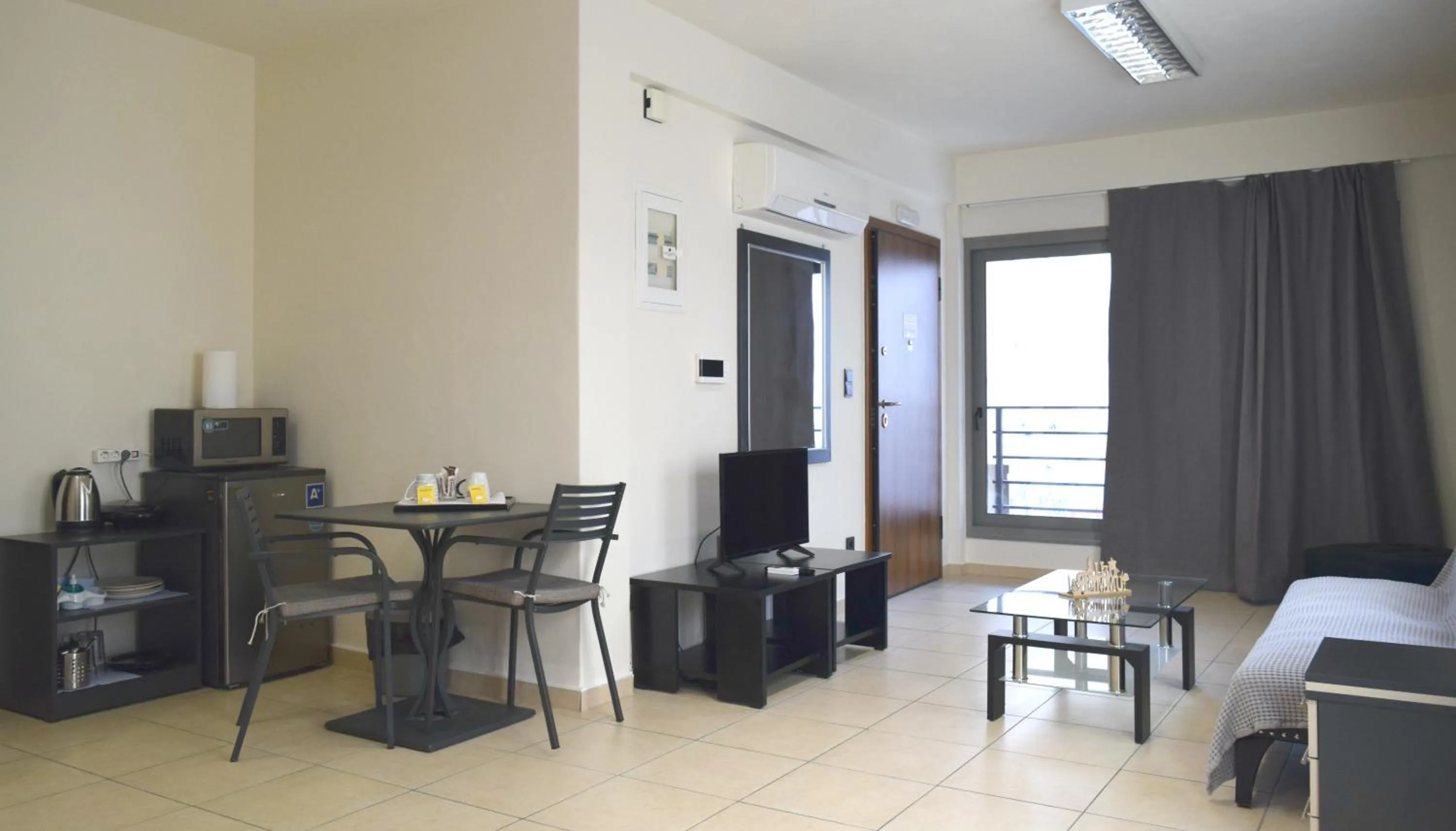 Photo of the whole room in Athenian Central Apartments