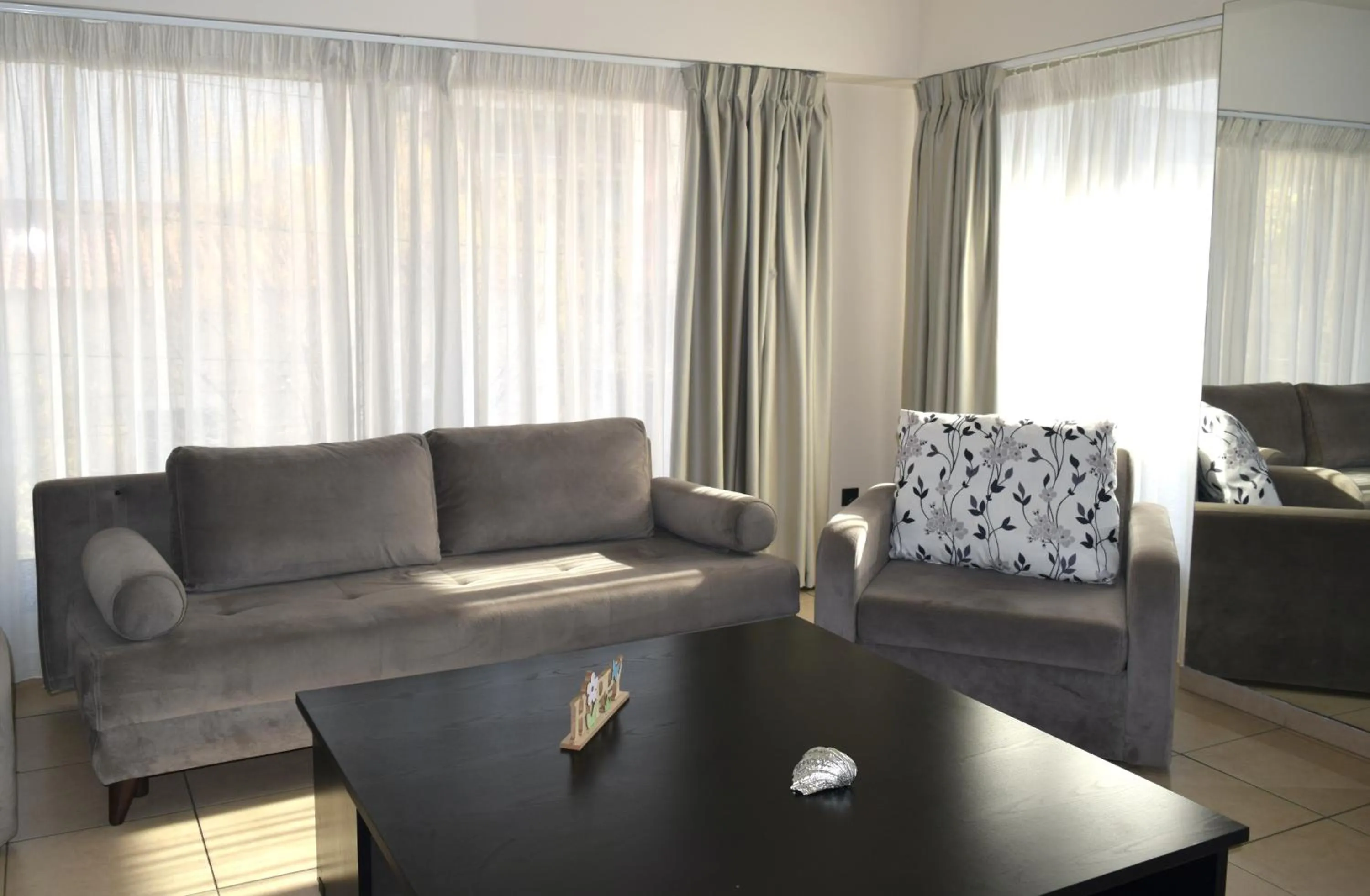 Seating area in Athenian Central Apartments