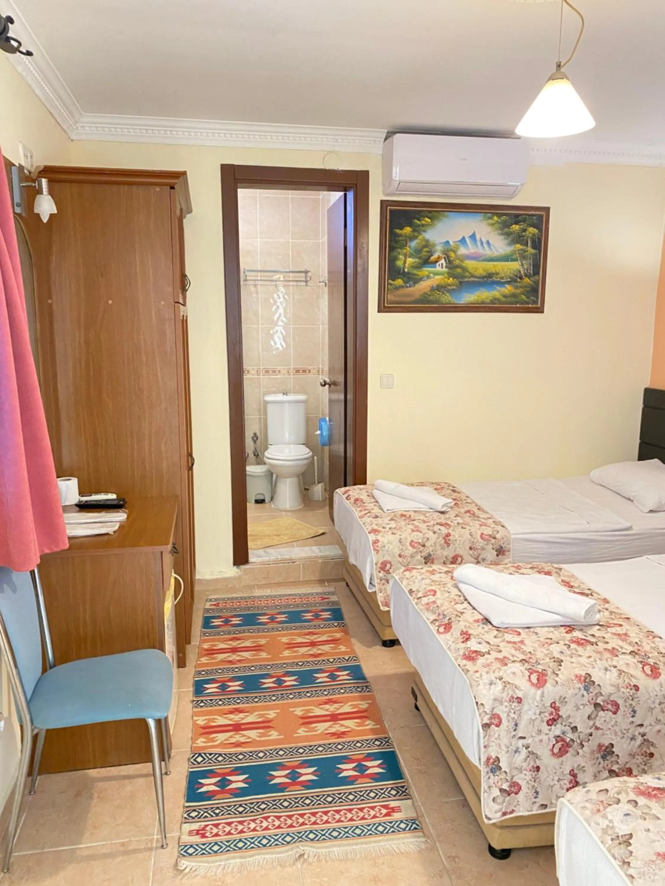 Bed in Sevin Hotel Pension