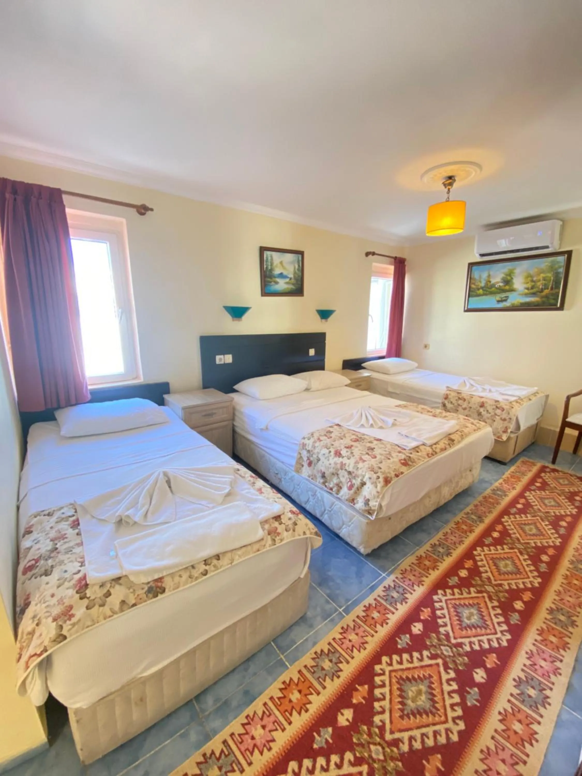 Bed in Sevin Hotel Pension