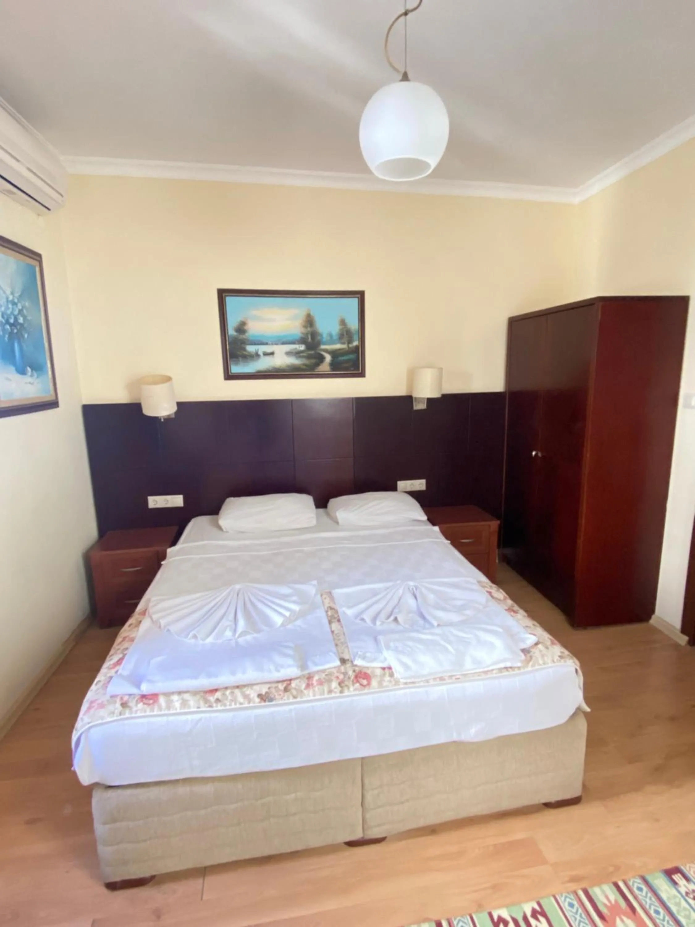 Bed in Sevin Hotel Pension