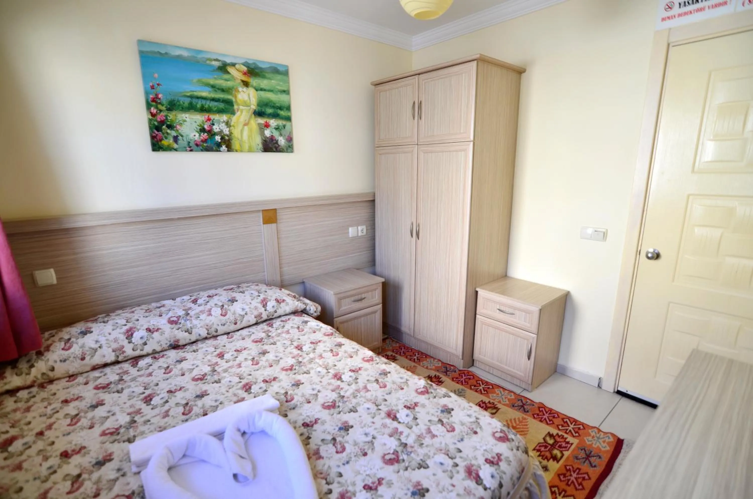 Bed in Sevin Hotel Pension