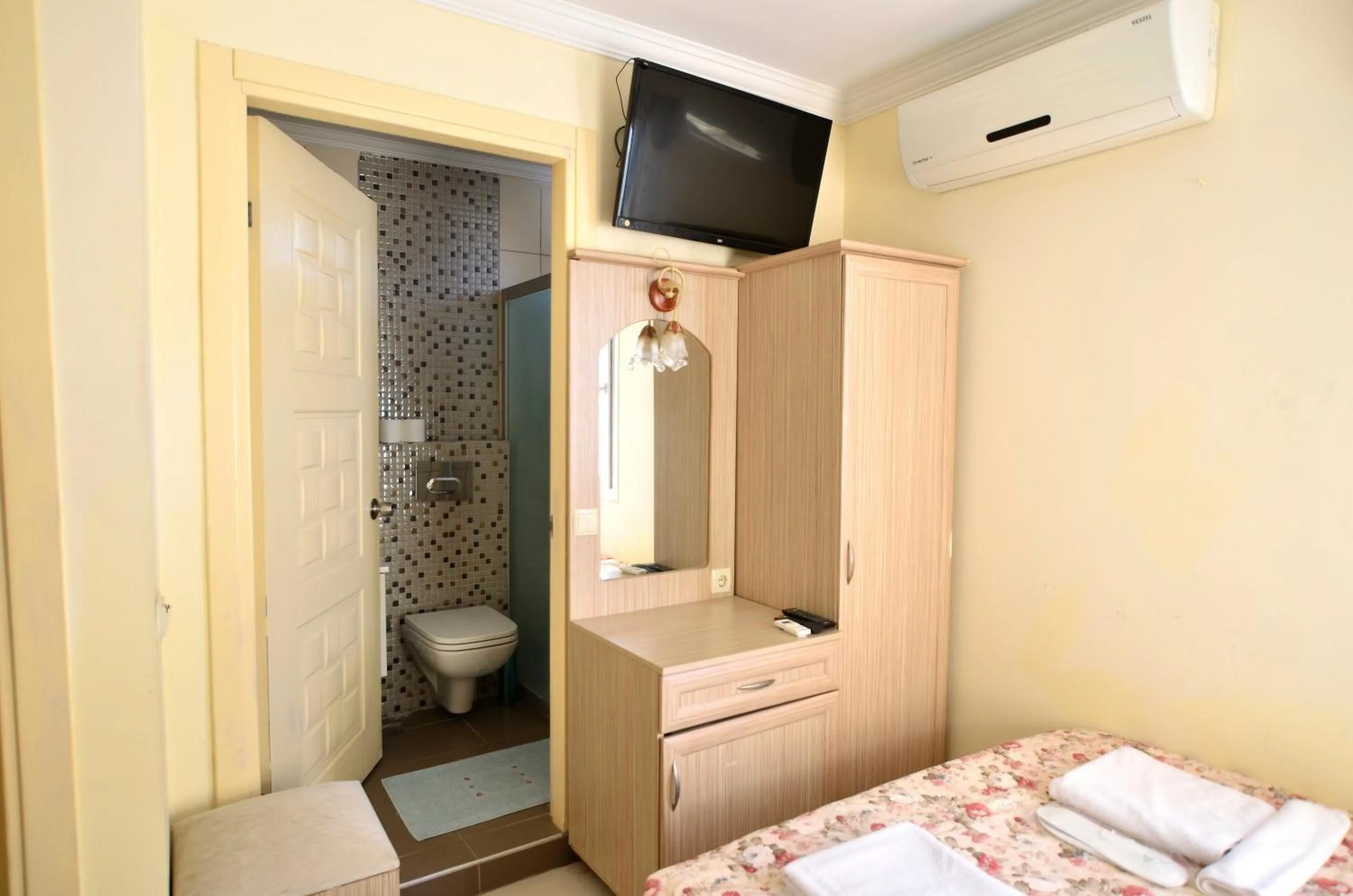 Bed in Sevin Hotel Pension