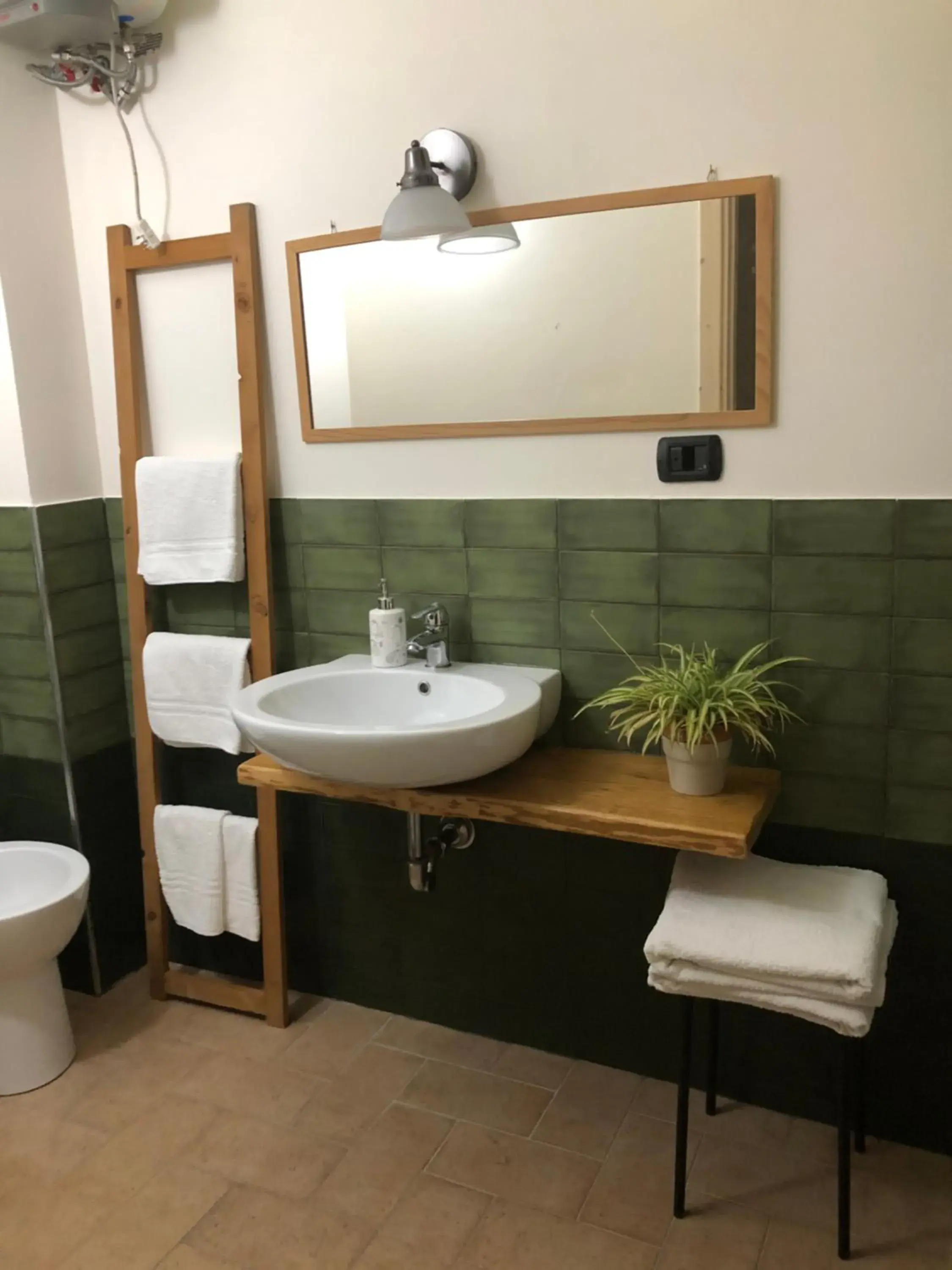 Superior Triple Room - single occupancy in Chicchi Di Melograno Superior Triple Room - single occupancy in Chicchi Di Melograno