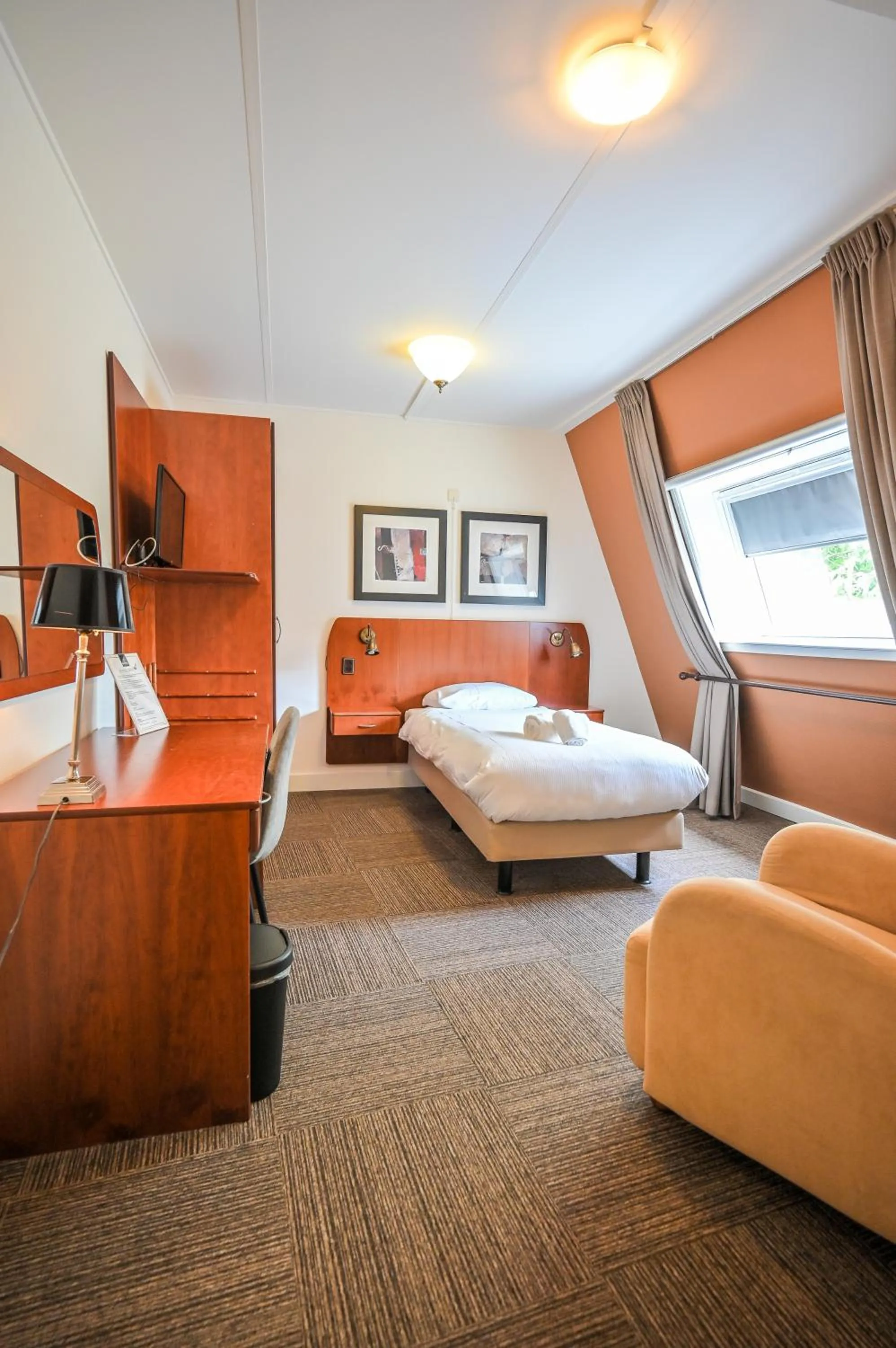 Bed in De Stobbe hotel & suites