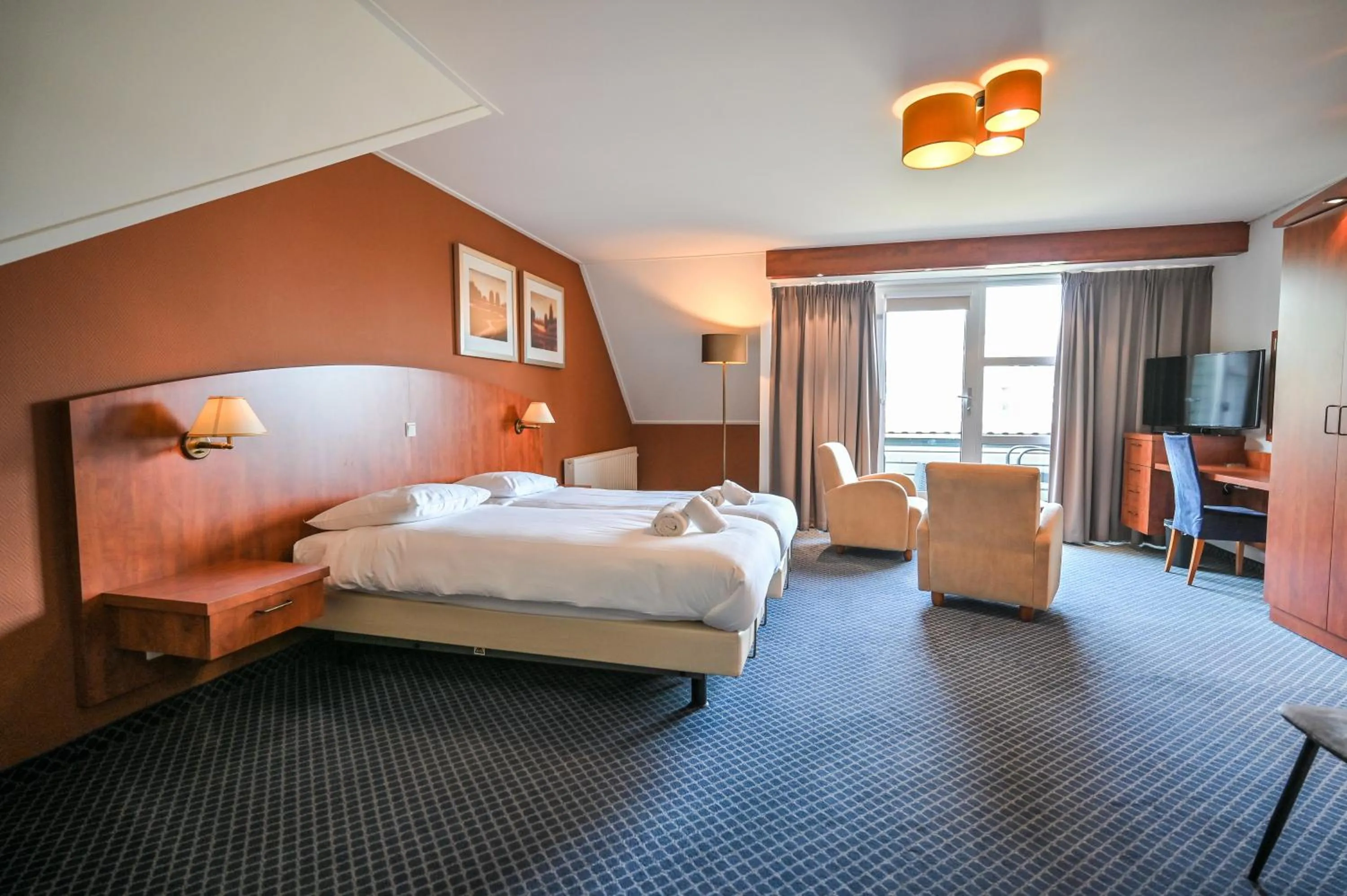Bed in De Stobbe hotel & suites