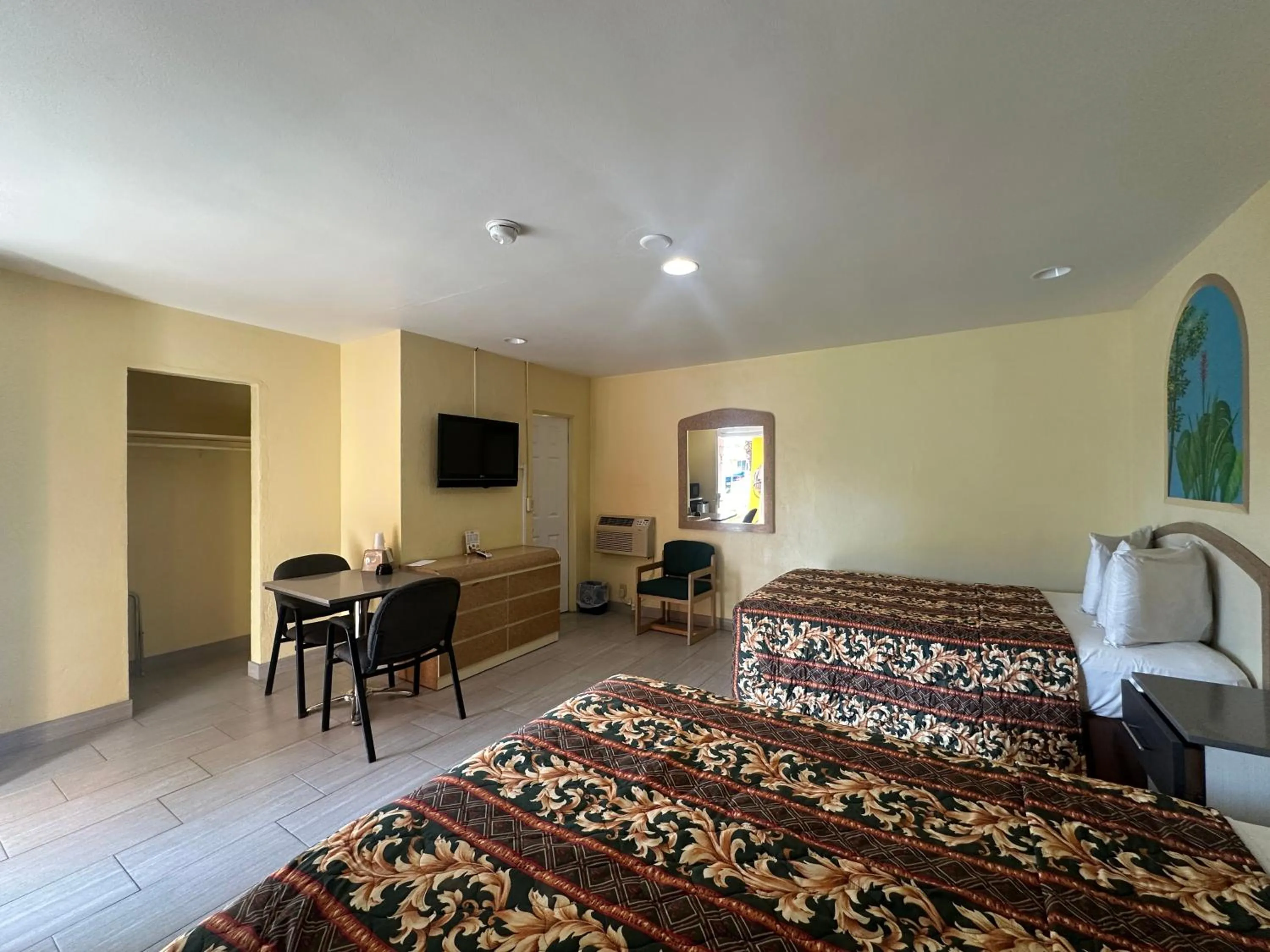 Bedroom, Bed in Super Inn By Oyo Daytona Beach Near Airport