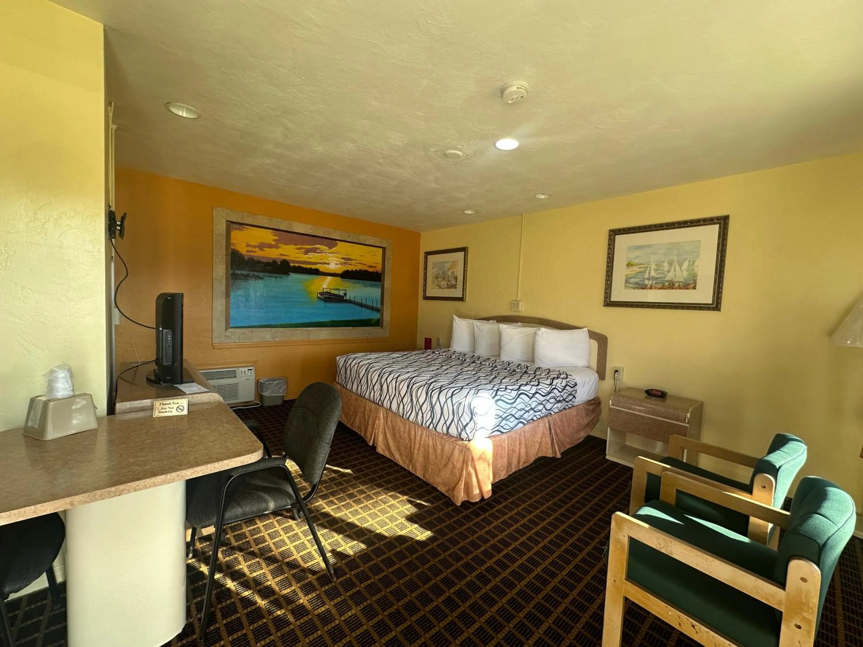 Bedroom, Bed in Super Inn By Oyo Daytona Beach Near Airport