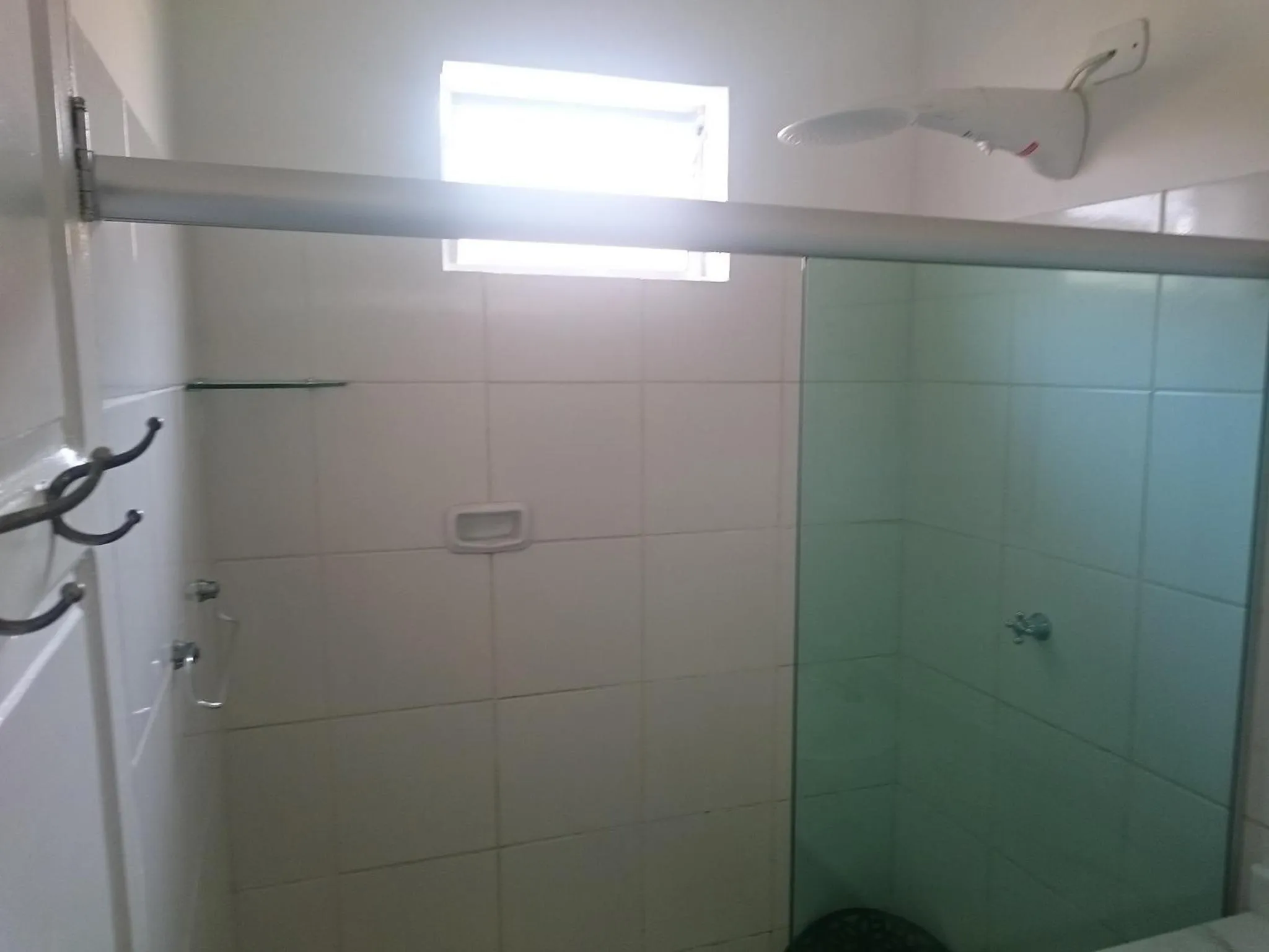 Shower in Hotel Pousada Acácia da Barra