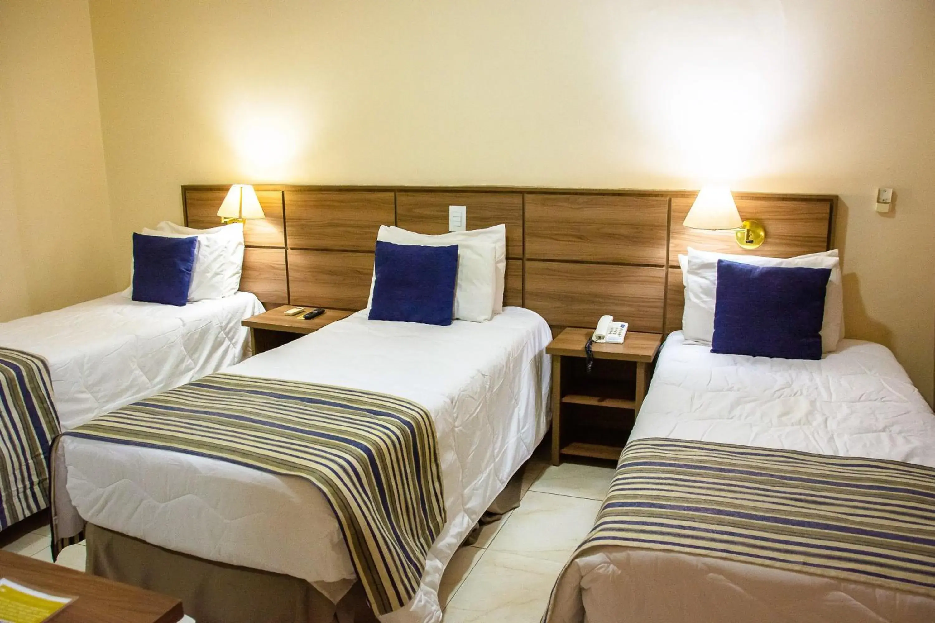 Standard Triple Room - single occupancy in Fenix Hotel Pouso Alegre Standard Triple Room - single occupancy in Fenix Hotel Pouso Alegre