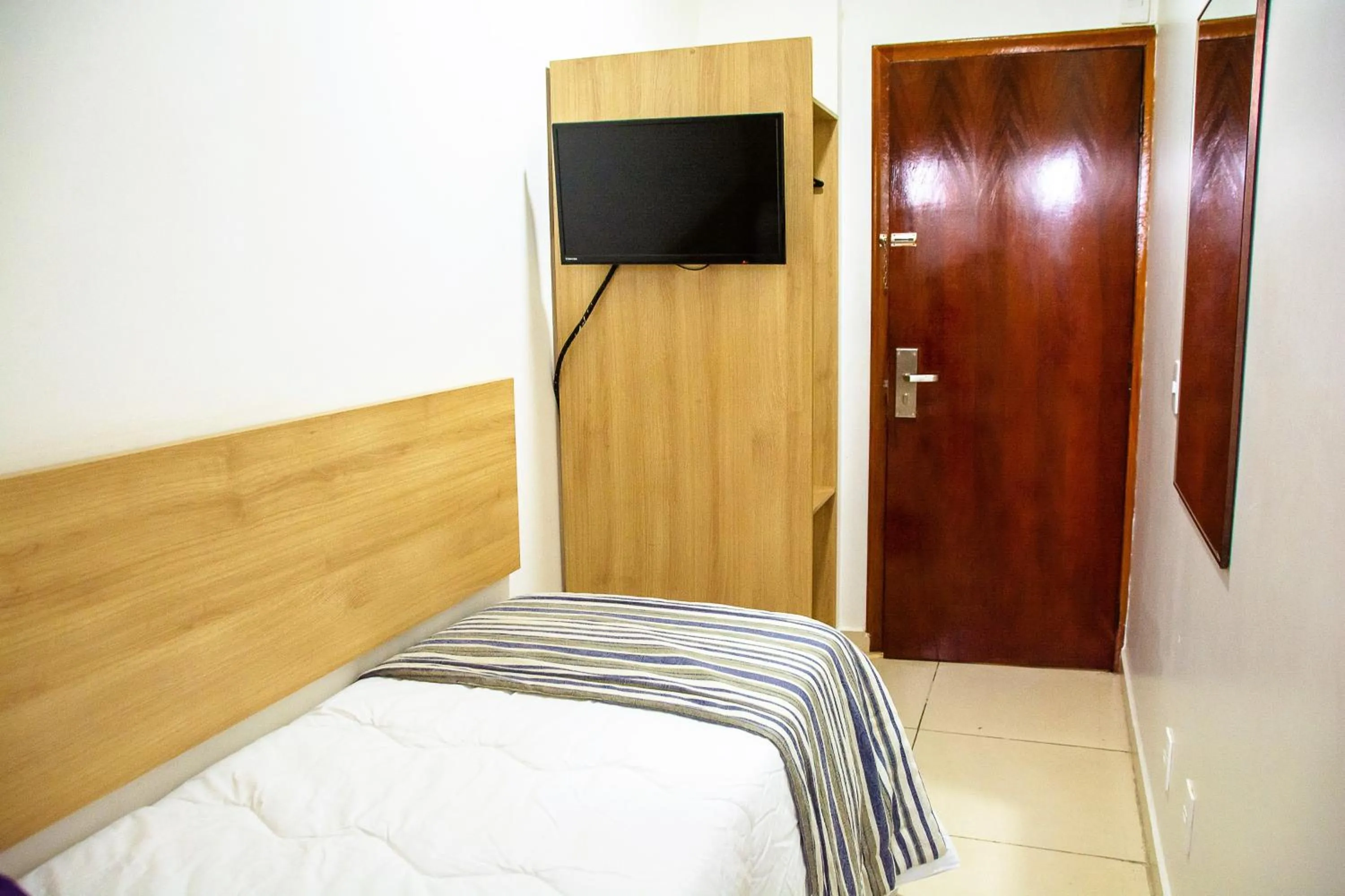 Bedroom, Bed in Fenix Hotel Pouso Alegre