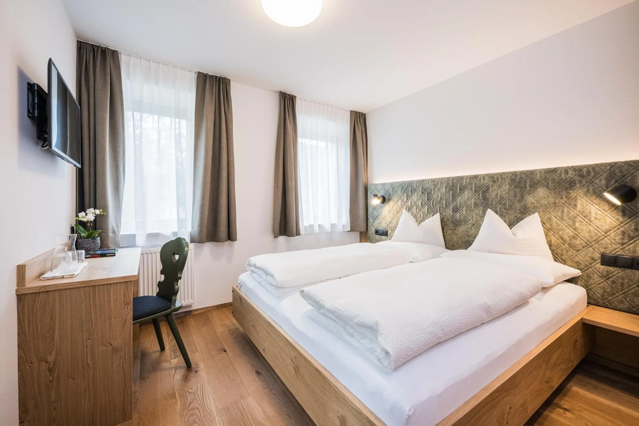 Bed in Gasthof Albergo Dolomiten
