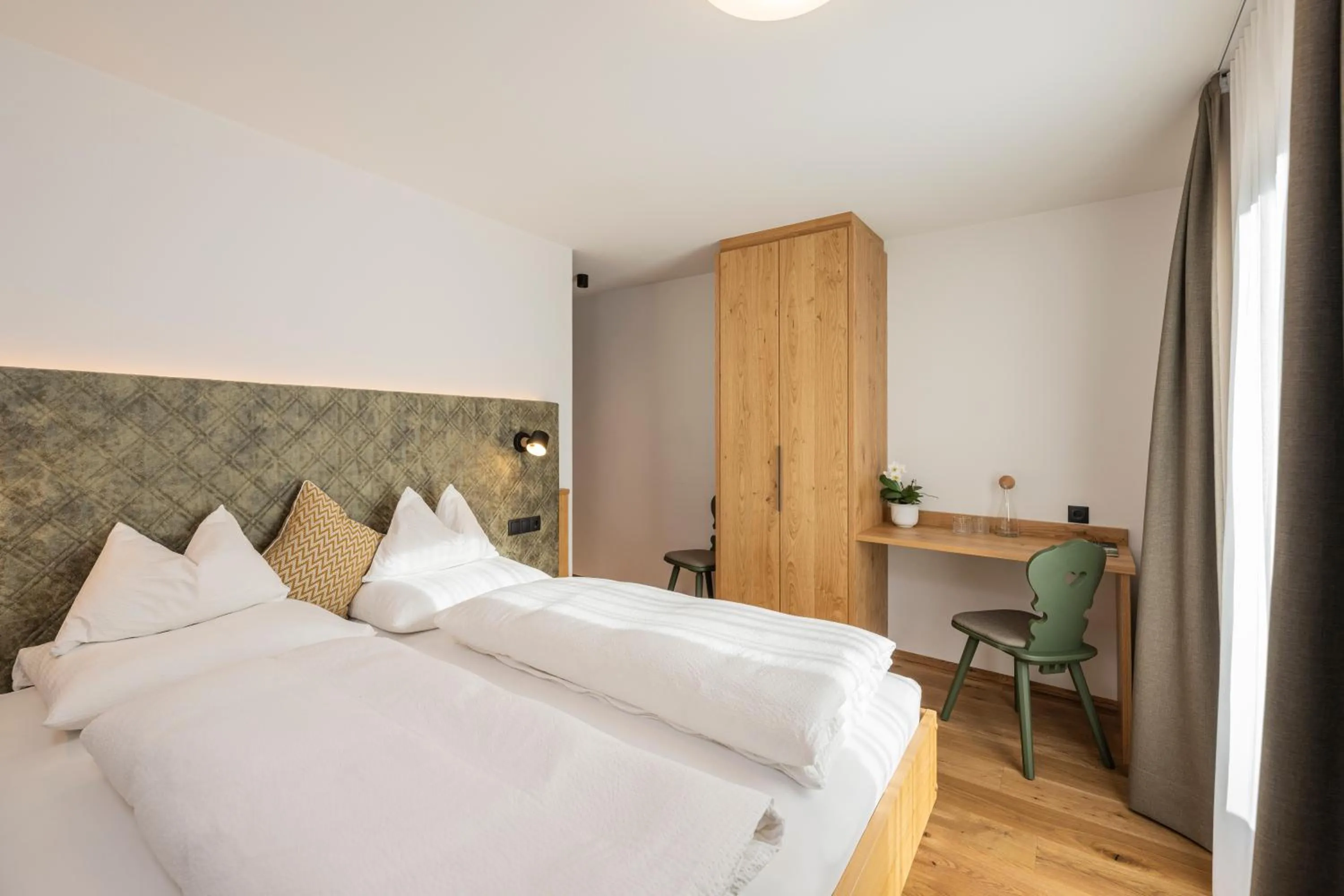 Bed in Gasthof Albergo Dolomiten