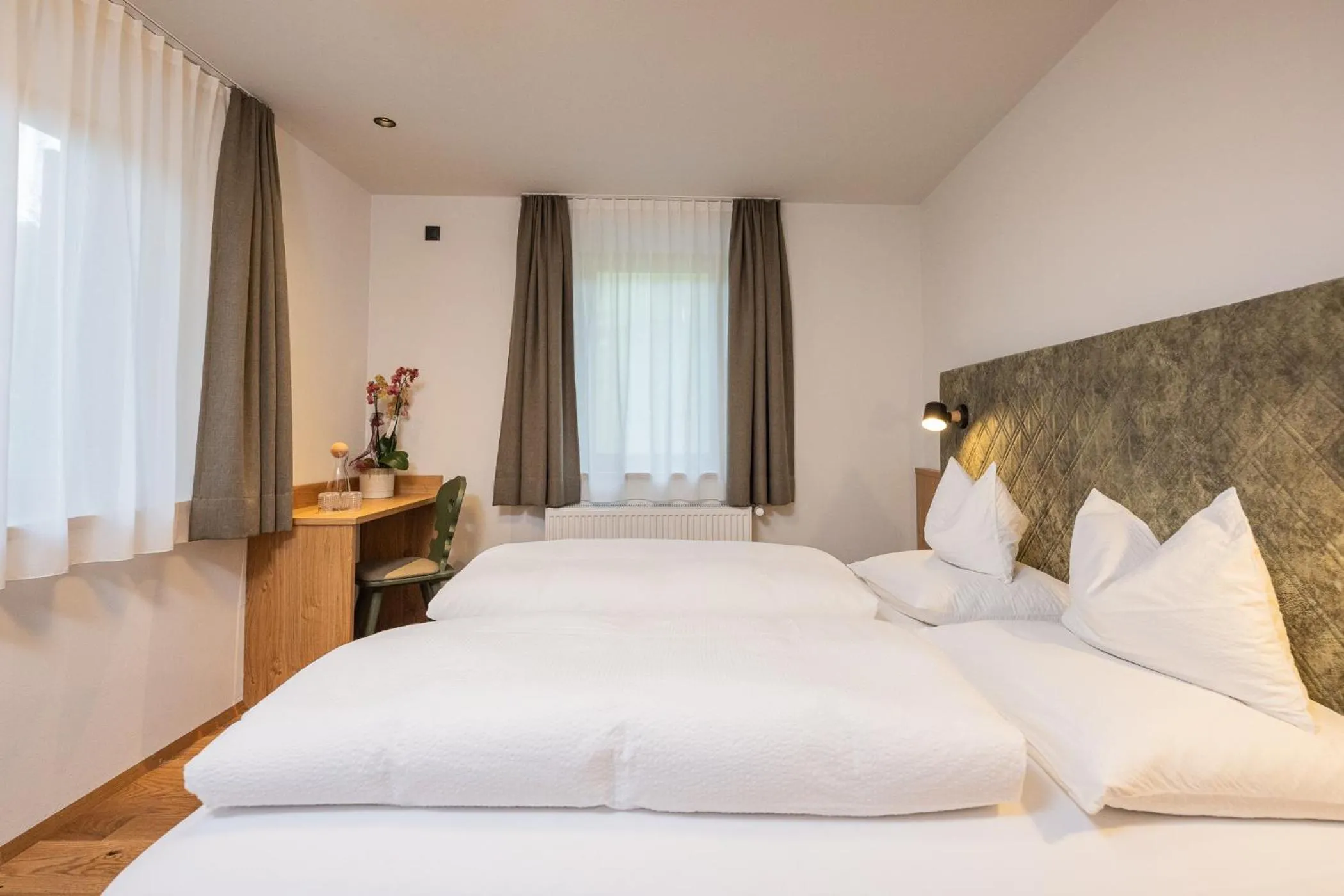 Bed in Gasthof Albergo Dolomiten