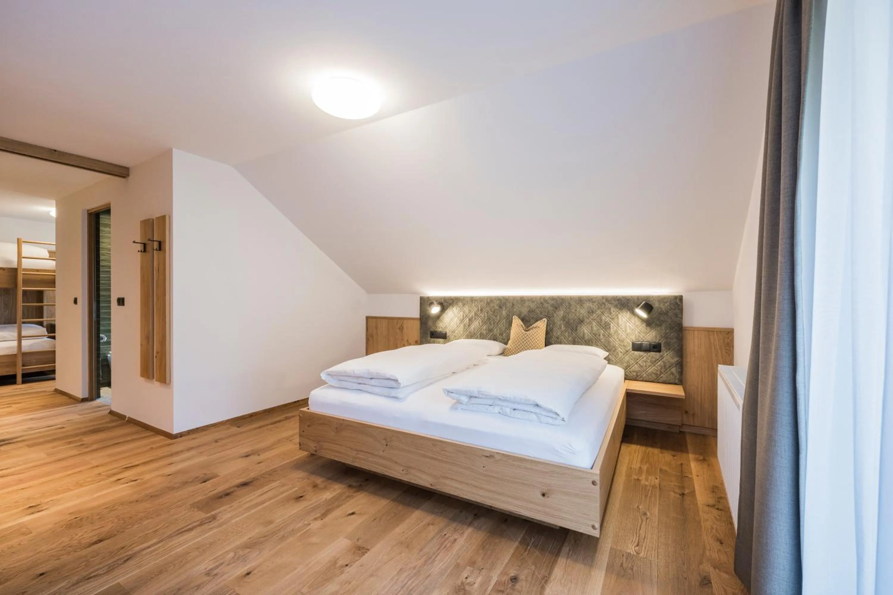 Bed in Gasthof Albergo Dolomiten