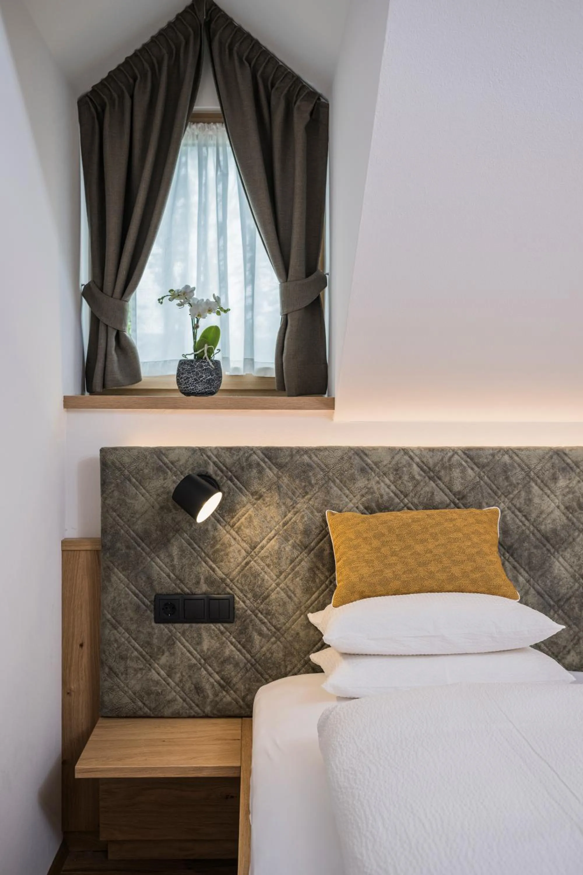 Bed in Gasthof Albergo Dolomiten