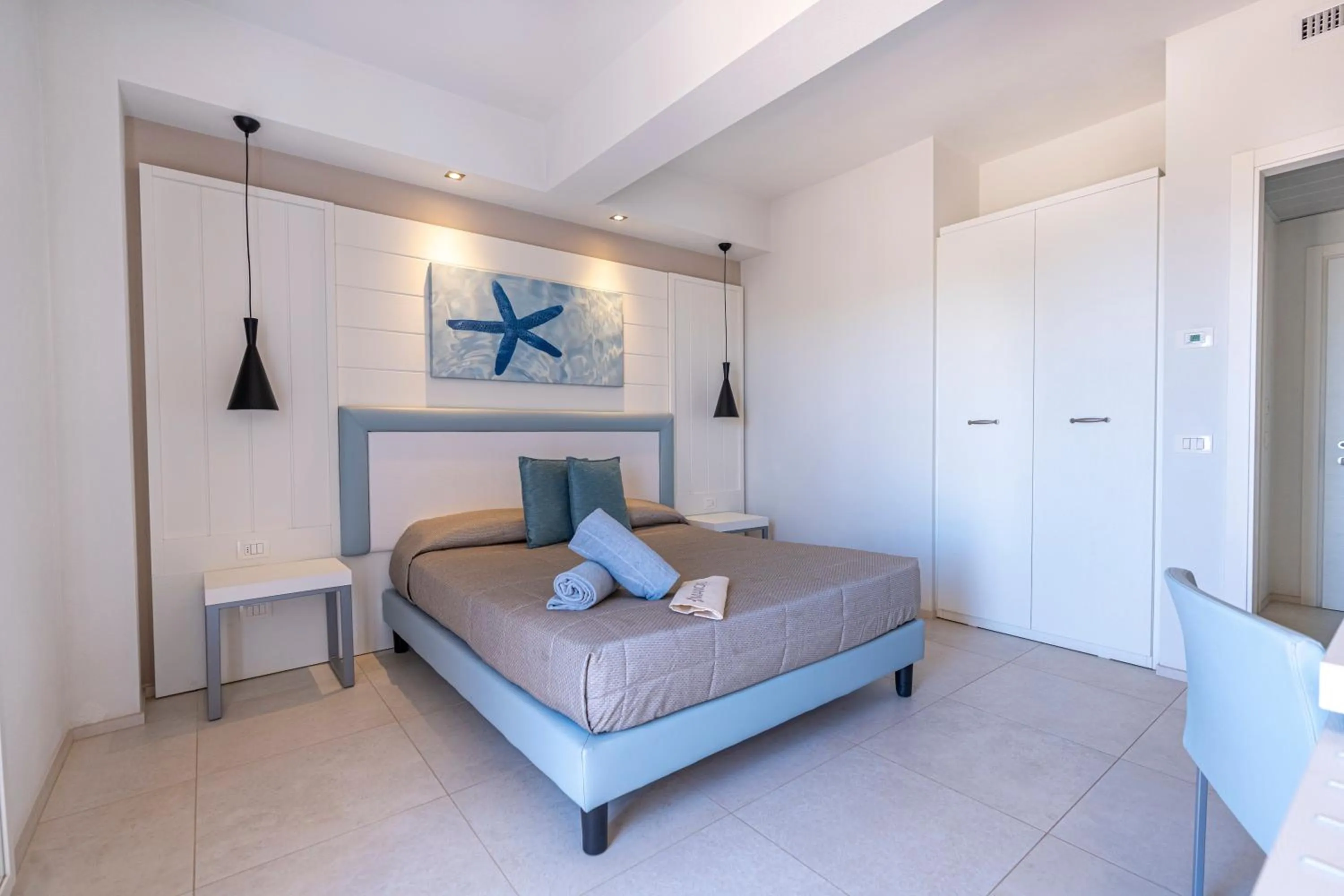 Bed in Mangia's Pollina Resort