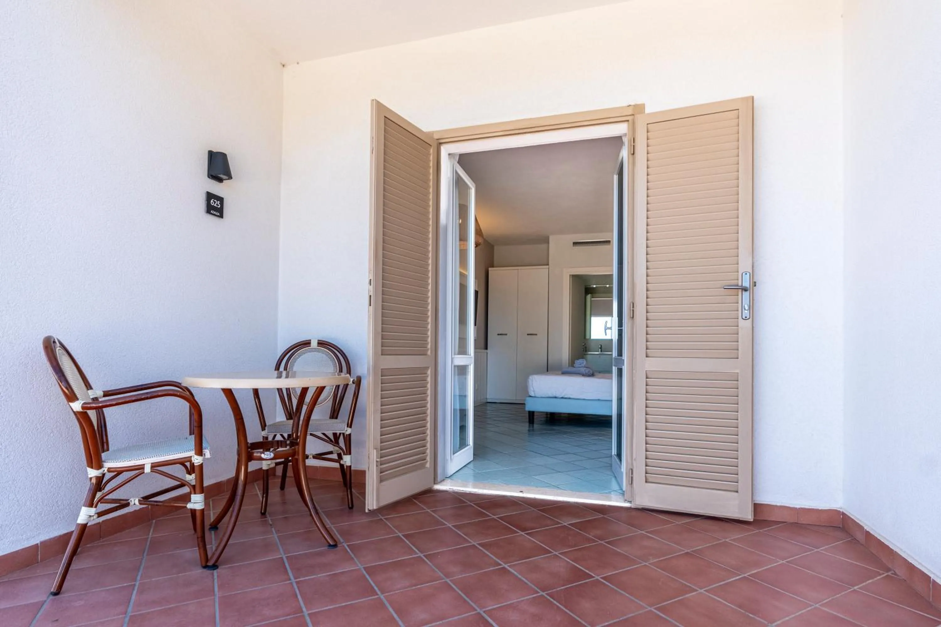 Patio in Mangia's Pollina Resort