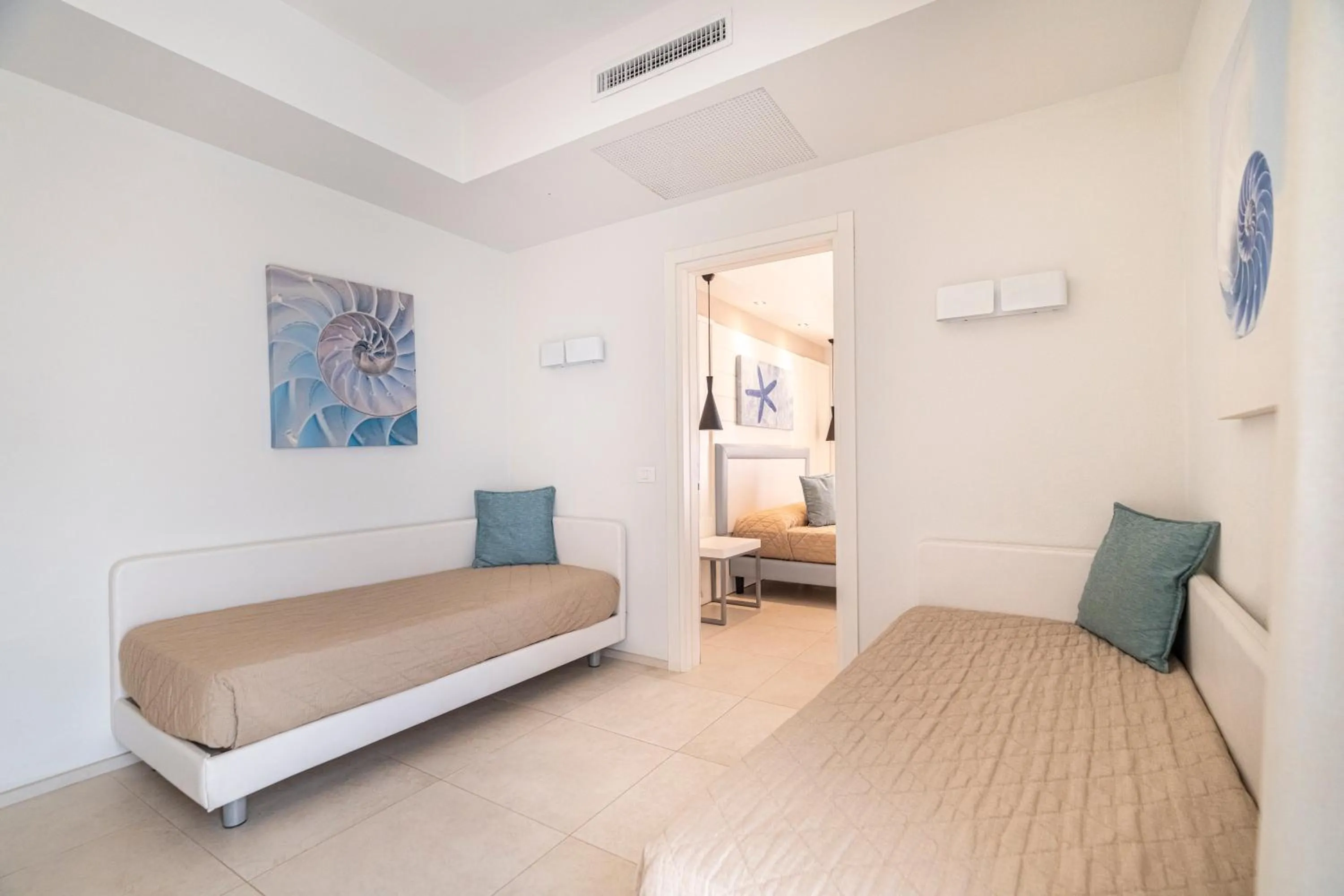 Bed in Mangia's Pollina Resort